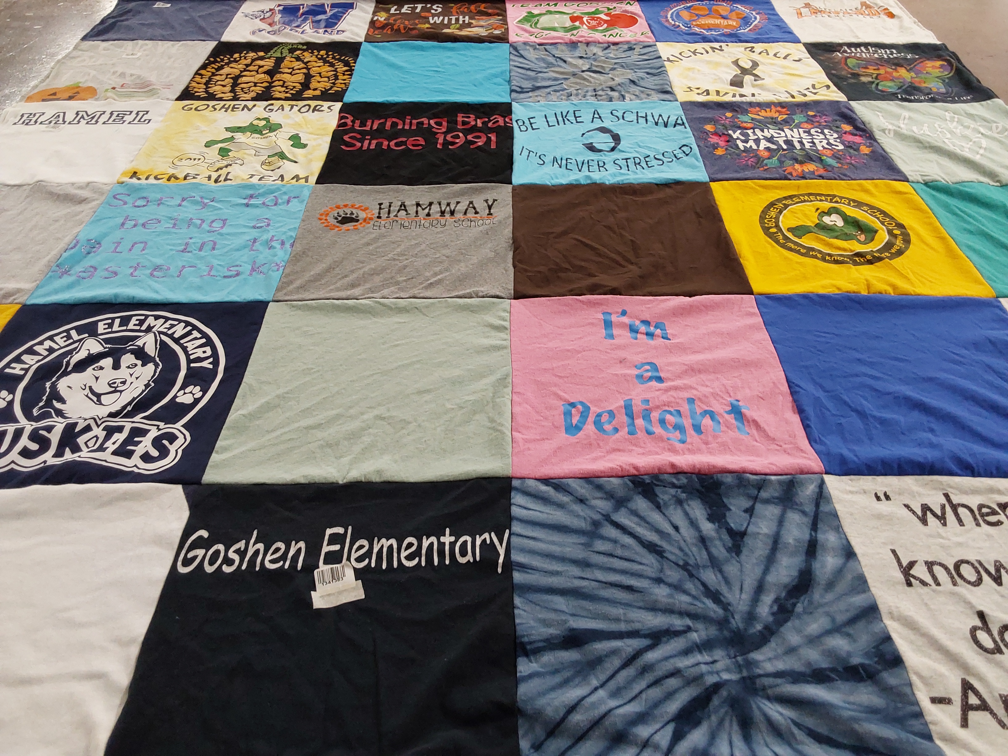 T-shirt quilt featuring hamel elementary huskies, goshens gators by Rebecca from IL