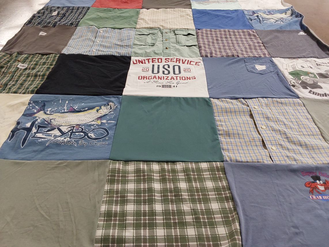 T-shirt quilt with fishing, volunteering themes by Ann from SC