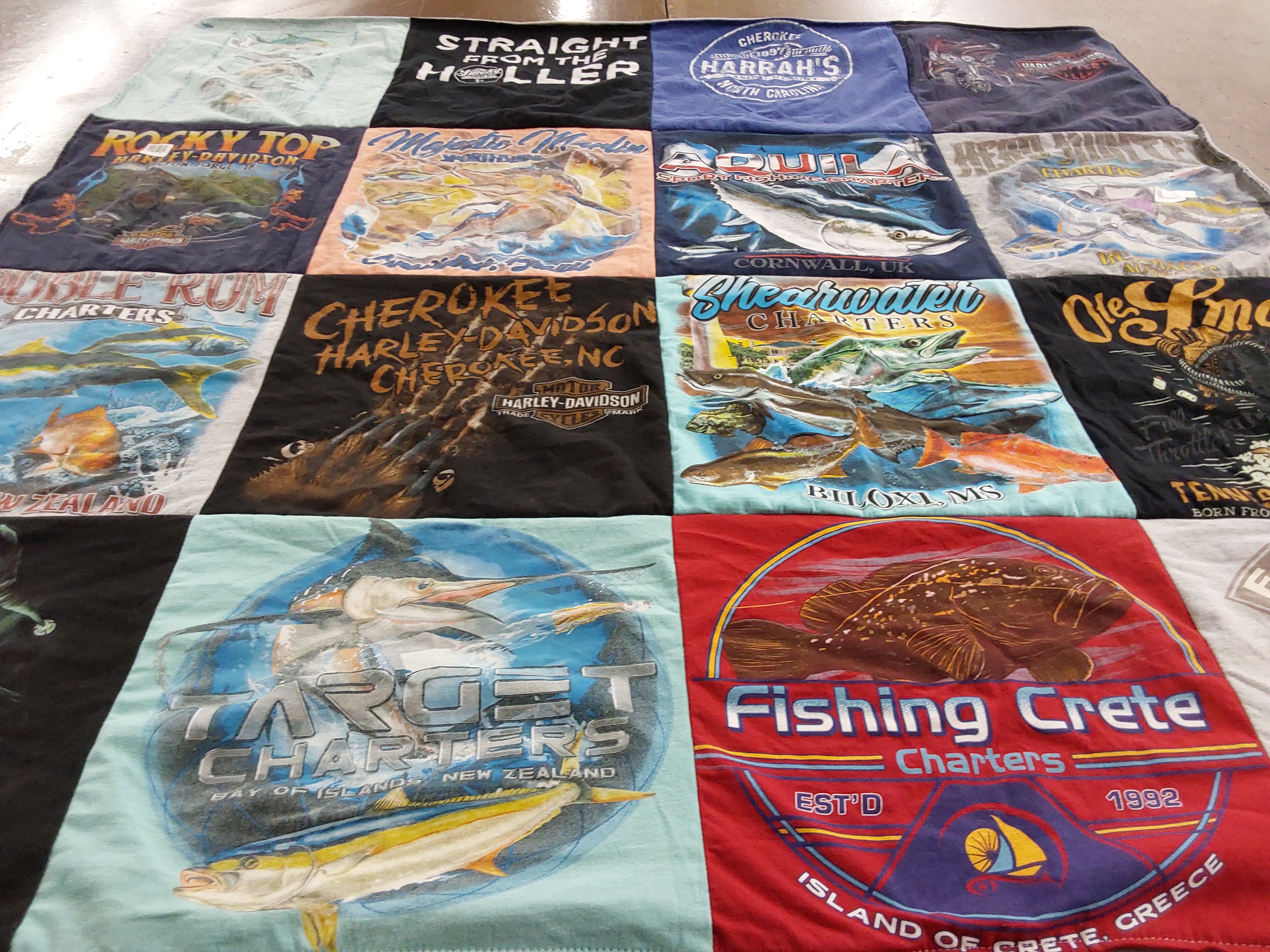 T-shirt quilt with fishing, motorcycles themes by Michelle from SC
