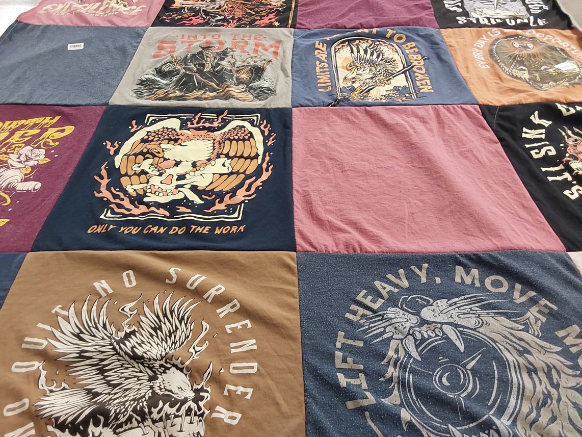 T-shirt quilt with fitness, motivational themes by Jennifer from TX
