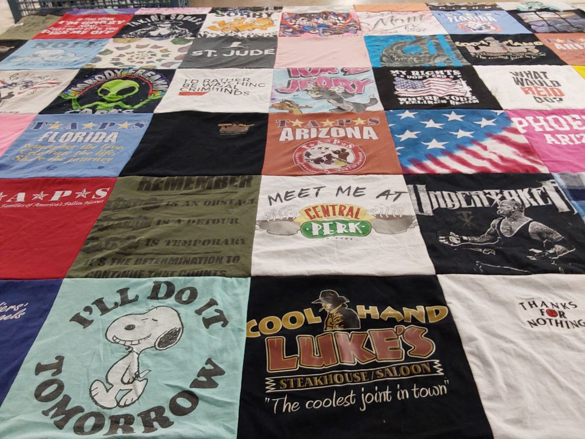 T-shirt quilt with cooking, sports themes by Brandi from CA
