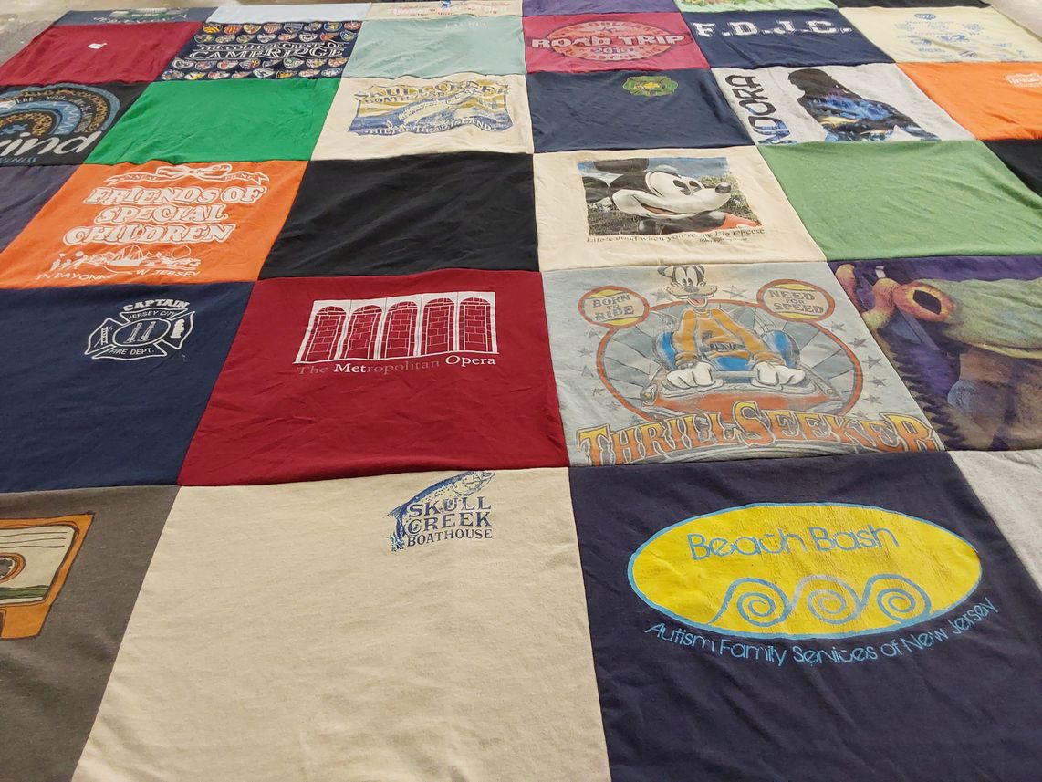 T-shirt quilt with autism advocacy, theater themes by Patrice from NJ
