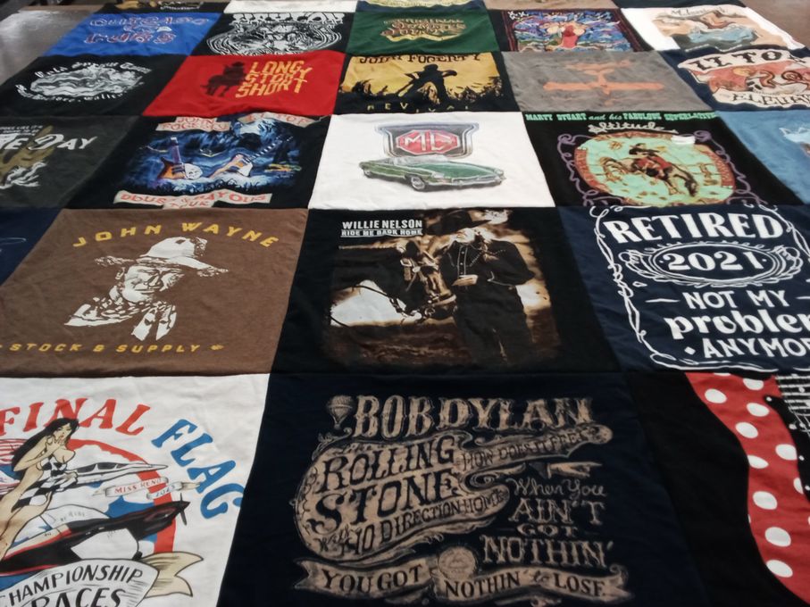 T-shirt quilt with music, movies themes by Carolyn from CA