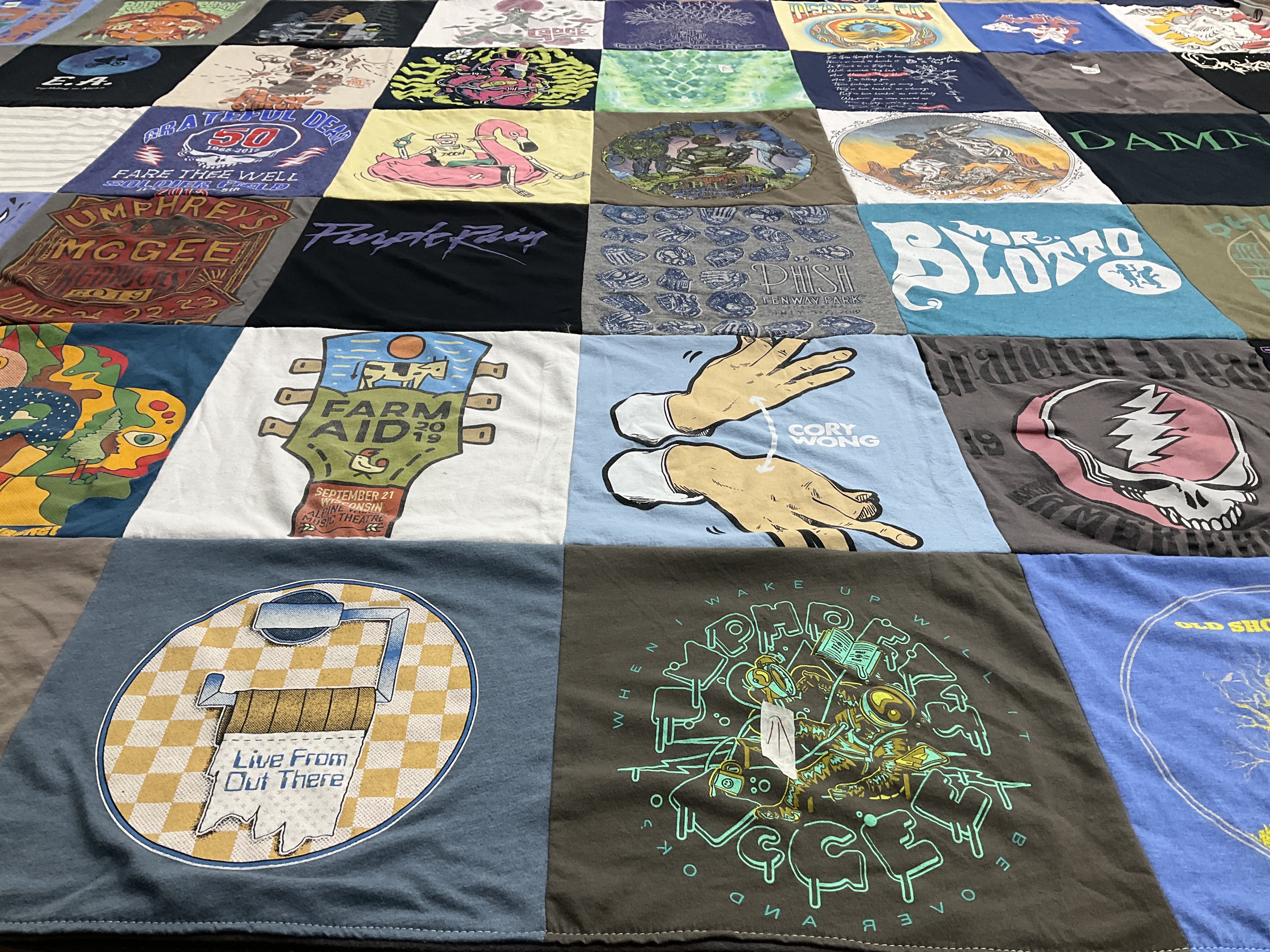T-shirt quilt with music, concerts themes by Phil from IL