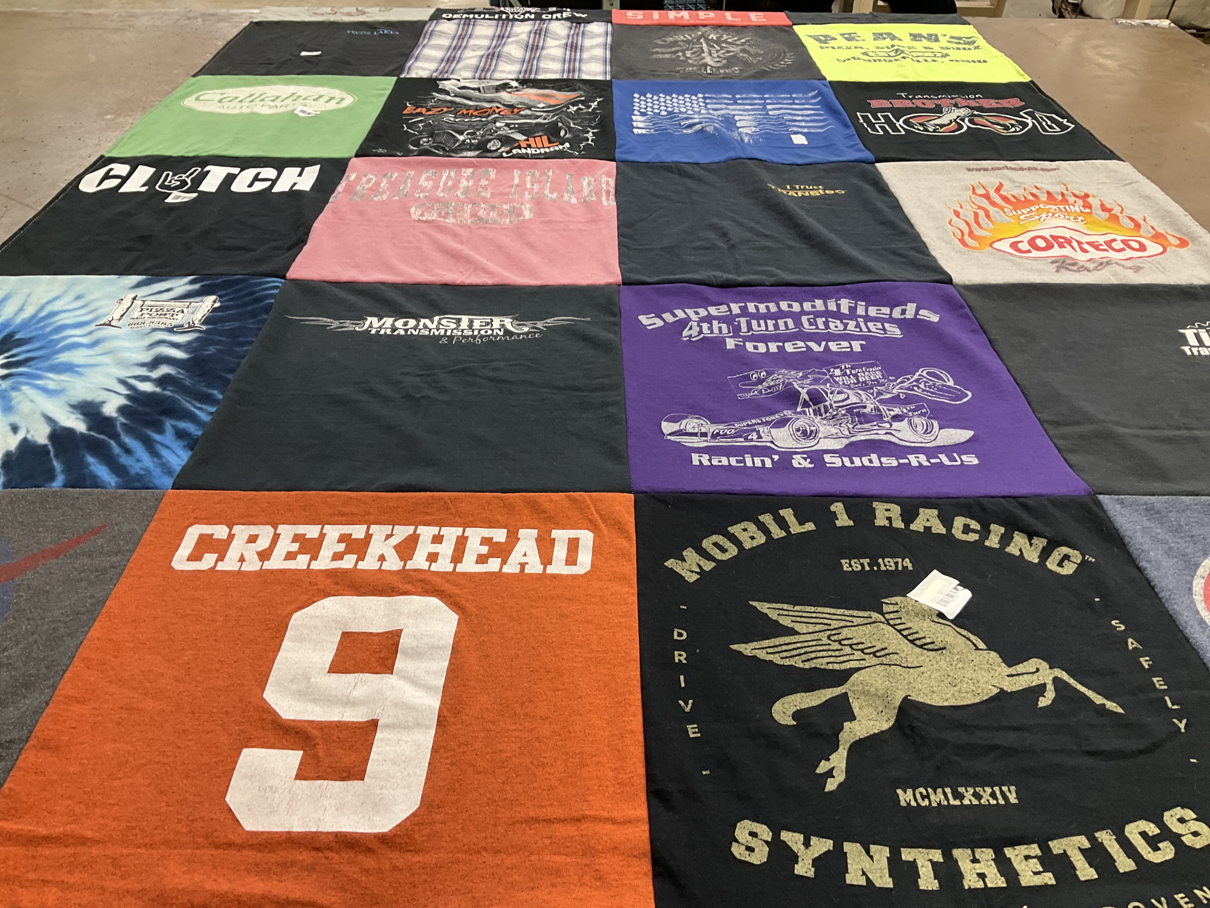 T-shirt quilt with racing, automotive themes by Allison from OH