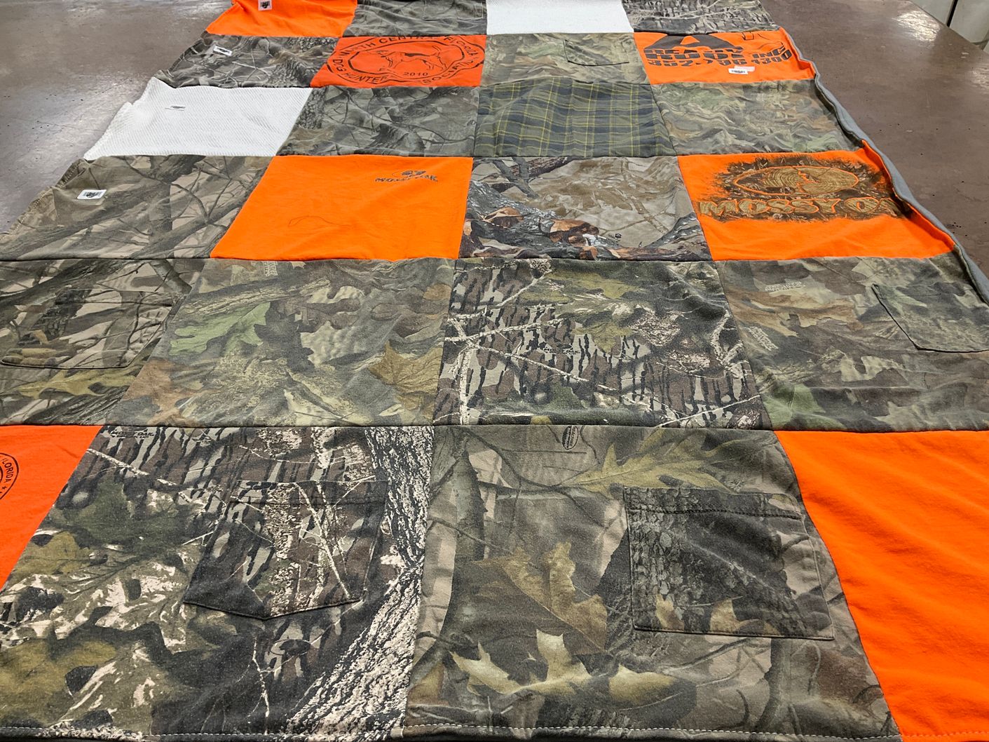 T-shirt quilt with hunting, outdoor activities themes by Jamie from AL