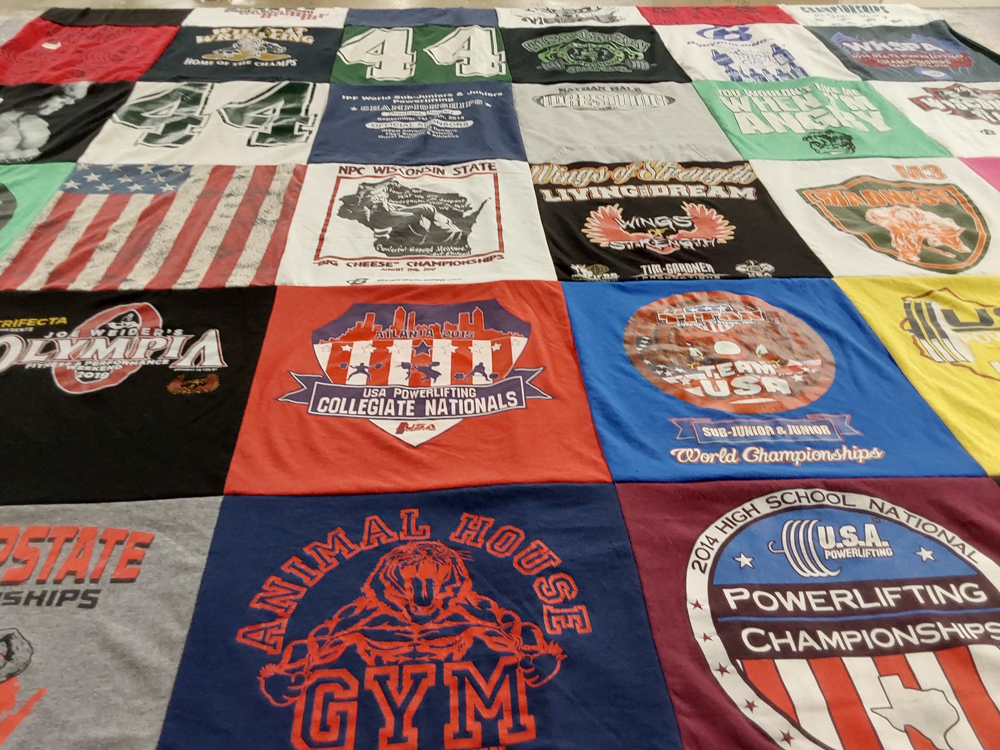 T-shirt quilt with powerlifting, fitness themes by Debra from WI
