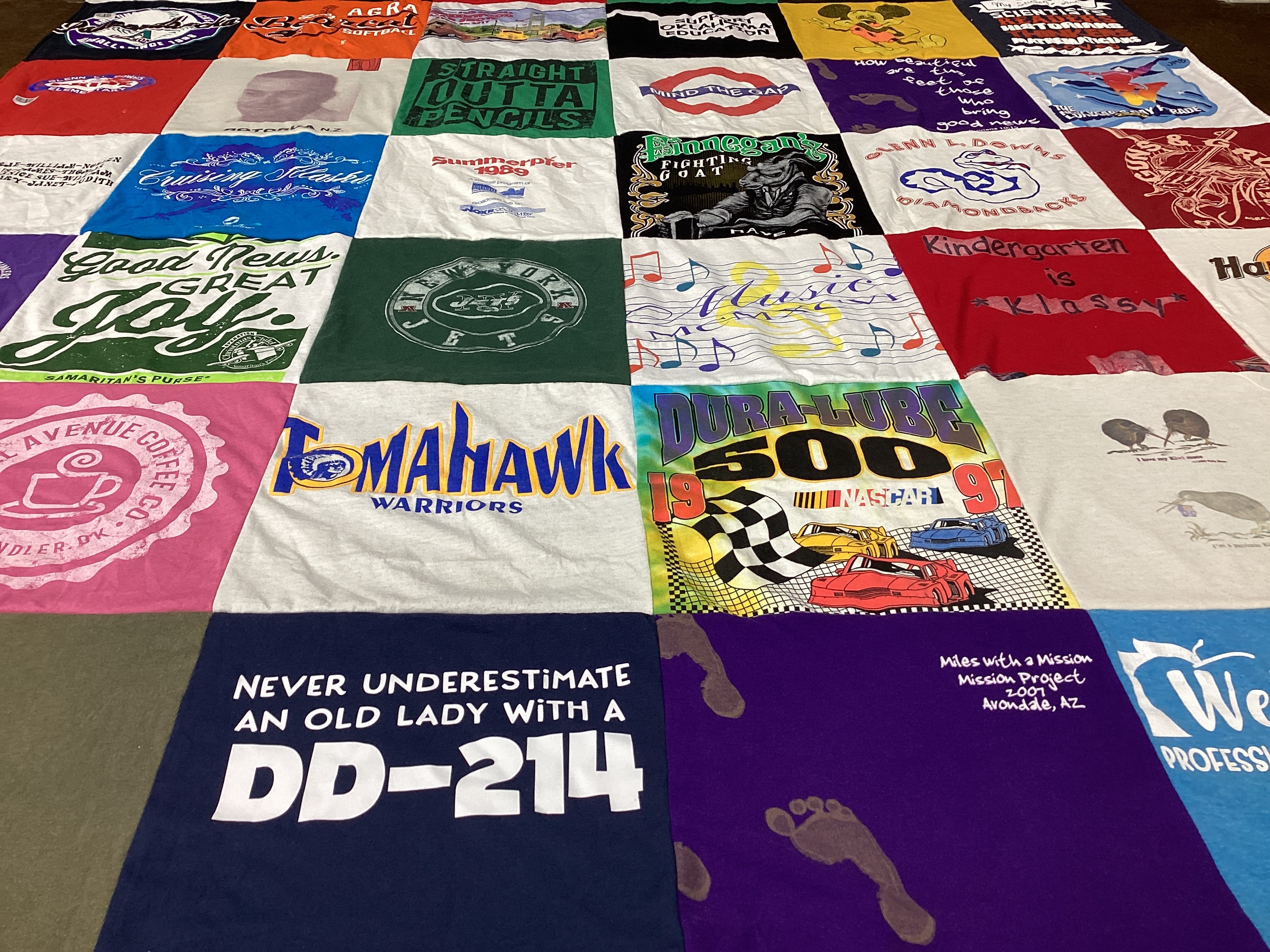 T-shirt quilt with music, sports themes by Eileen from OK