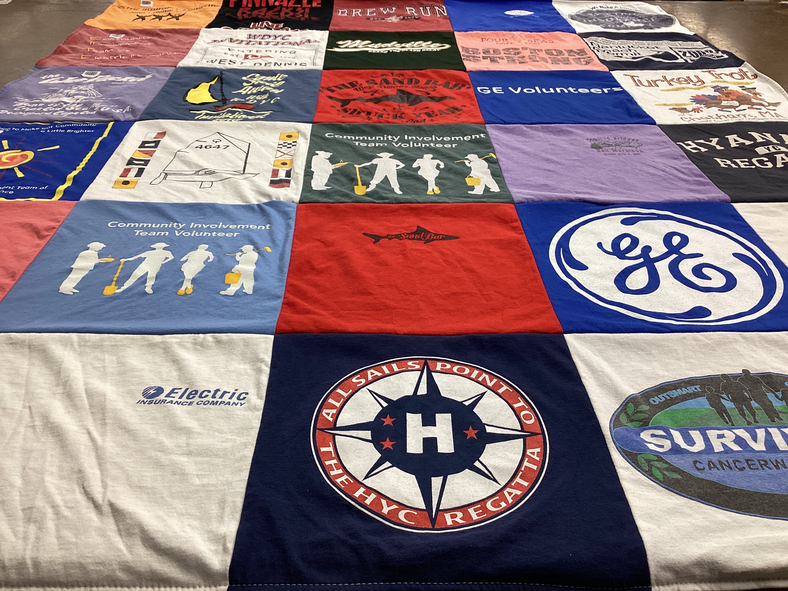T-shirt quilt with volunteering, community service themes by Julie from MA