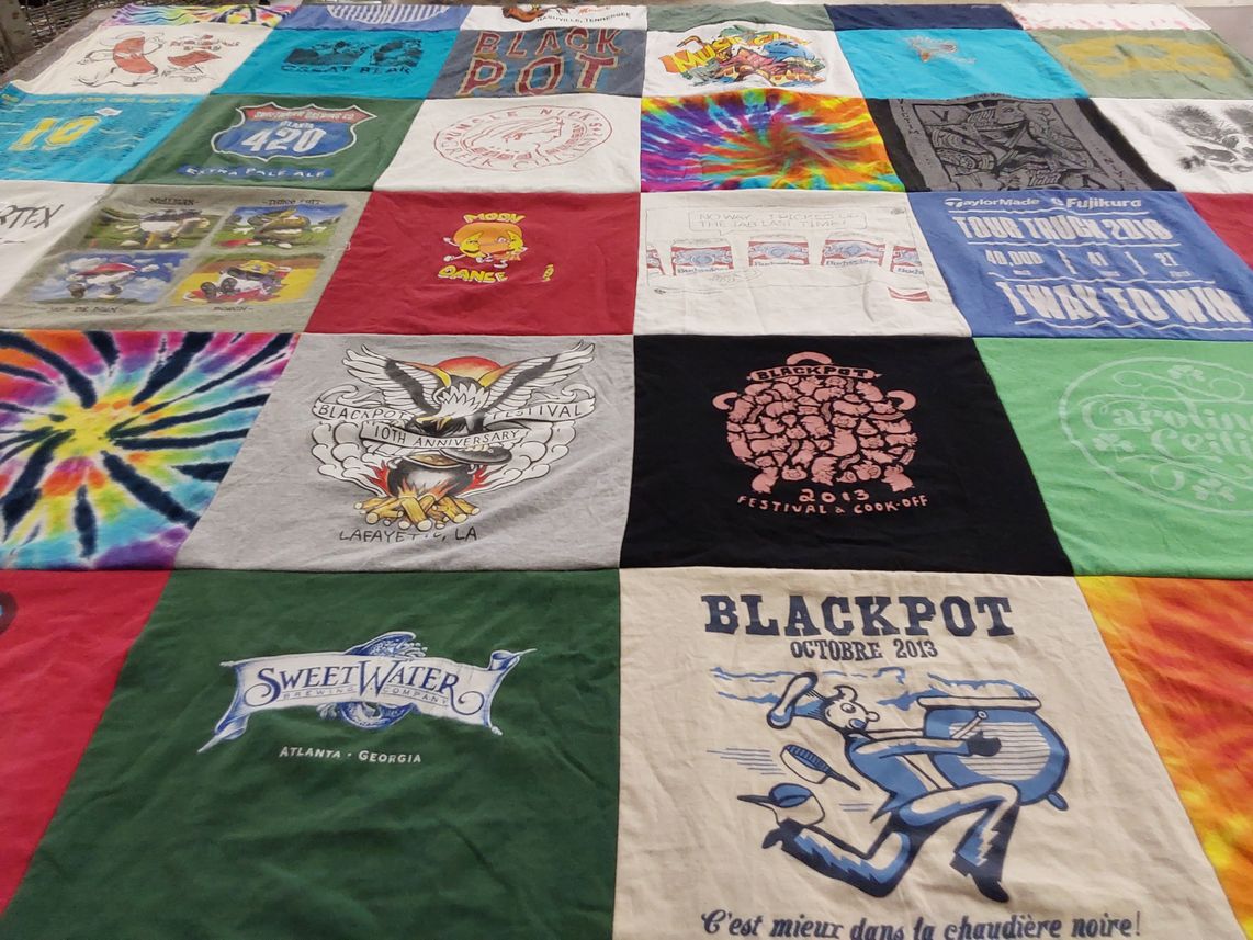 T-shirt quilt with festivals, cooking themes by Robert from GA