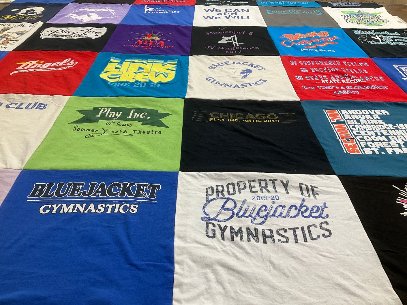 T-shirt quilt with gymnastics, theatre themes by Becca from MN