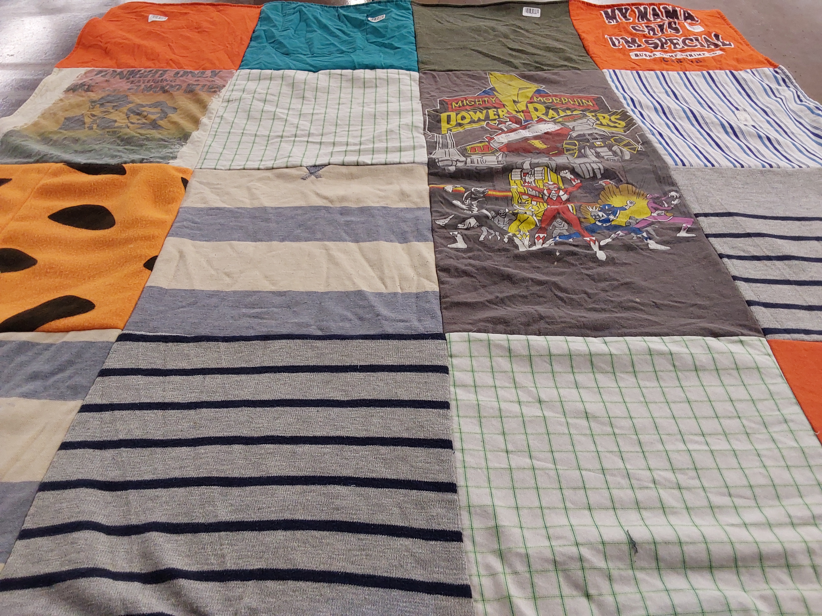 T-shirt quilt with cartoons, superheroes themes by Nicole from NY