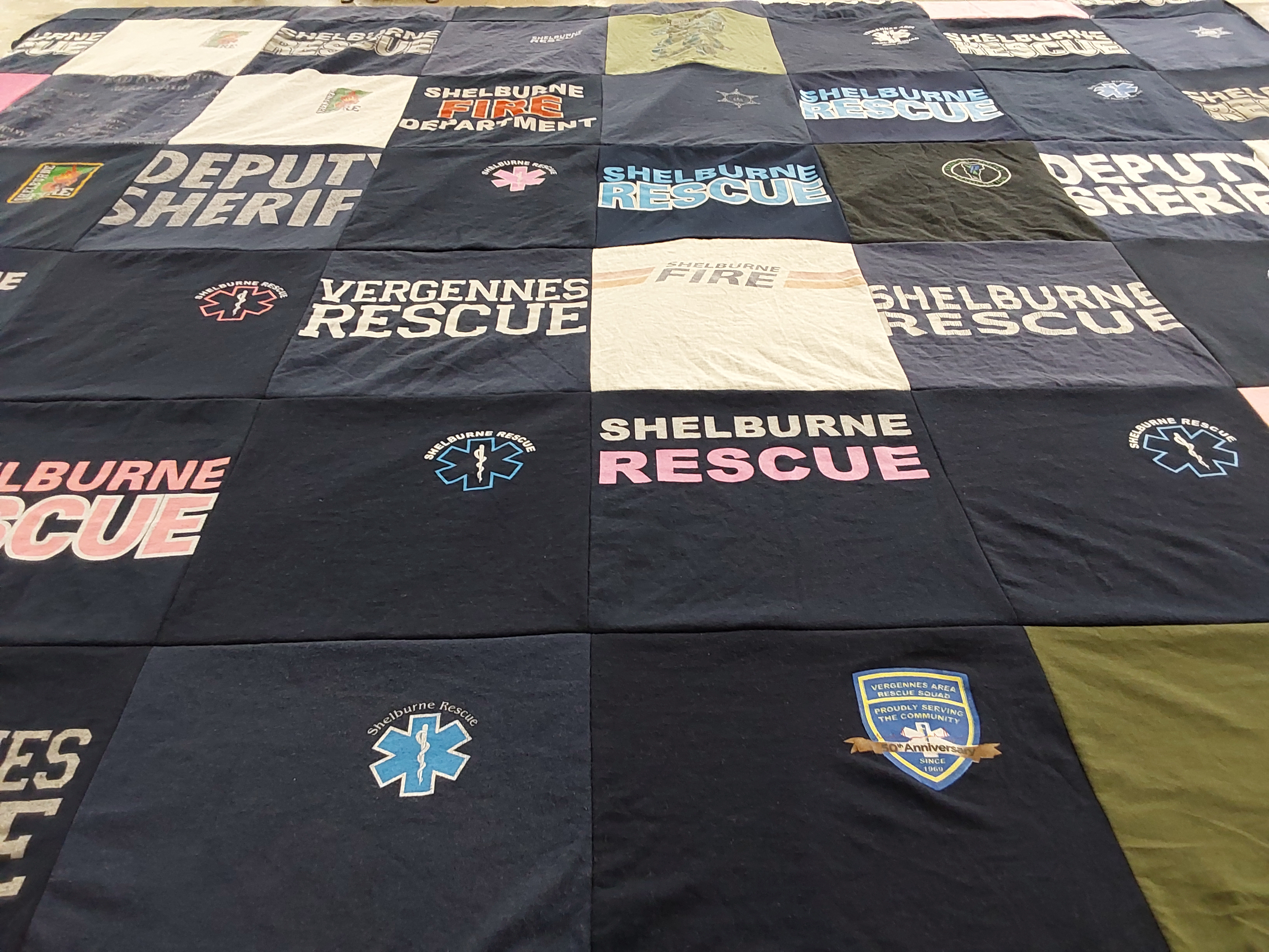 T-shirt quilt with emergency services, firefighting themes by Devin from VT