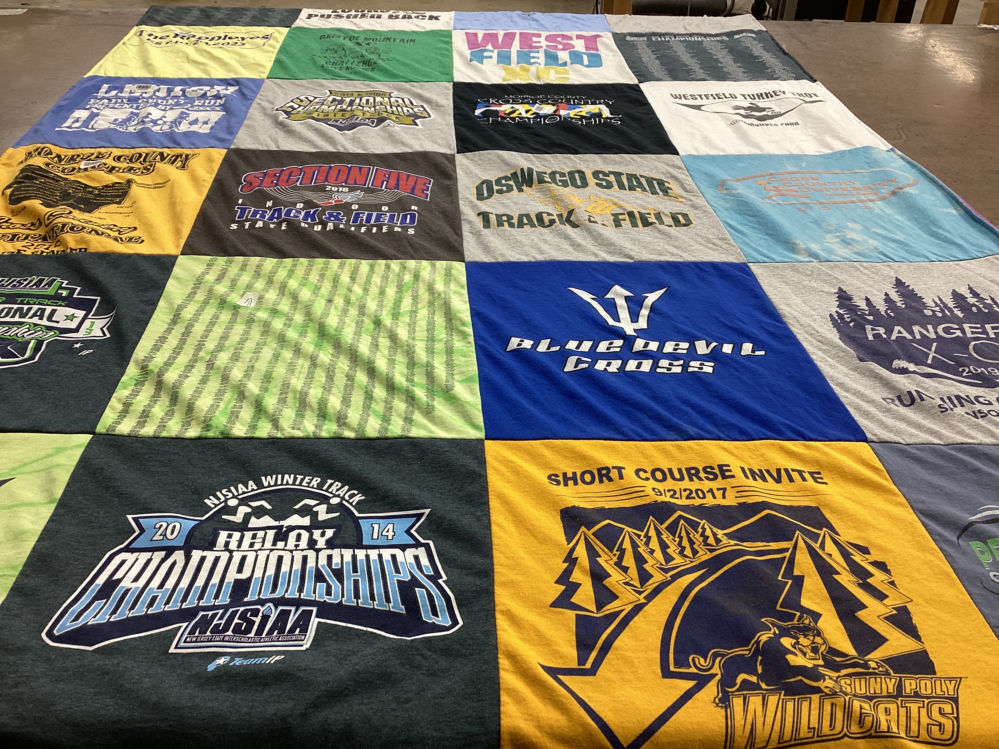 T-shirt quilt featuring blue devil cross country, wildcats track and field by Gabrielle from NJ