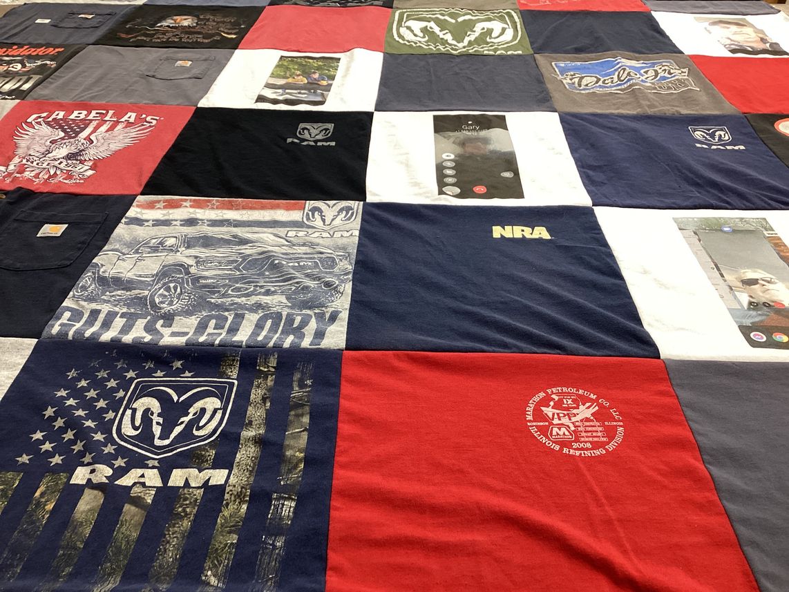 T-shirt quilt with hunting, outdoor activities themes by Lora from IL