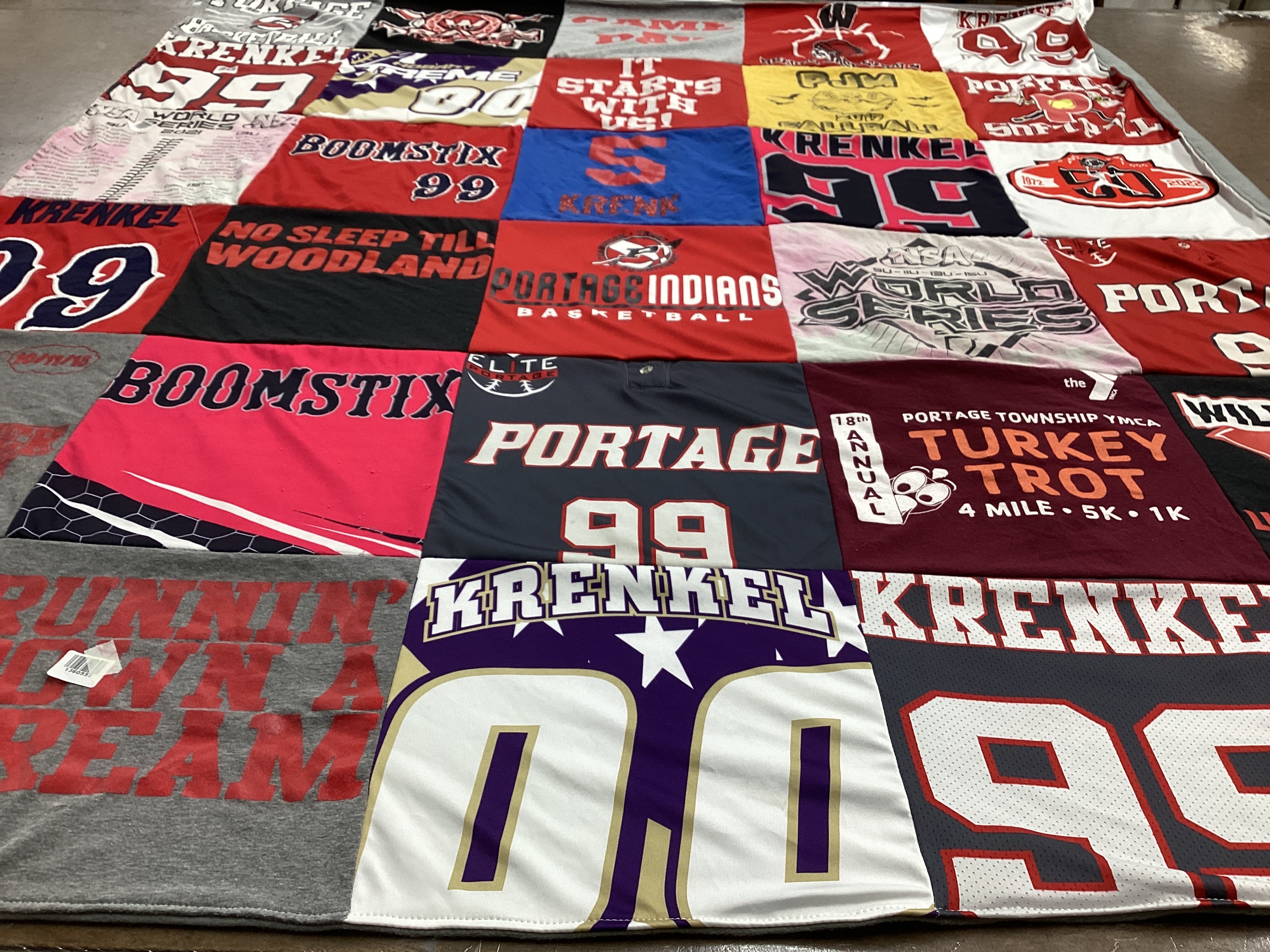 T-shirt quilt with sports, running themes by Erin from IN