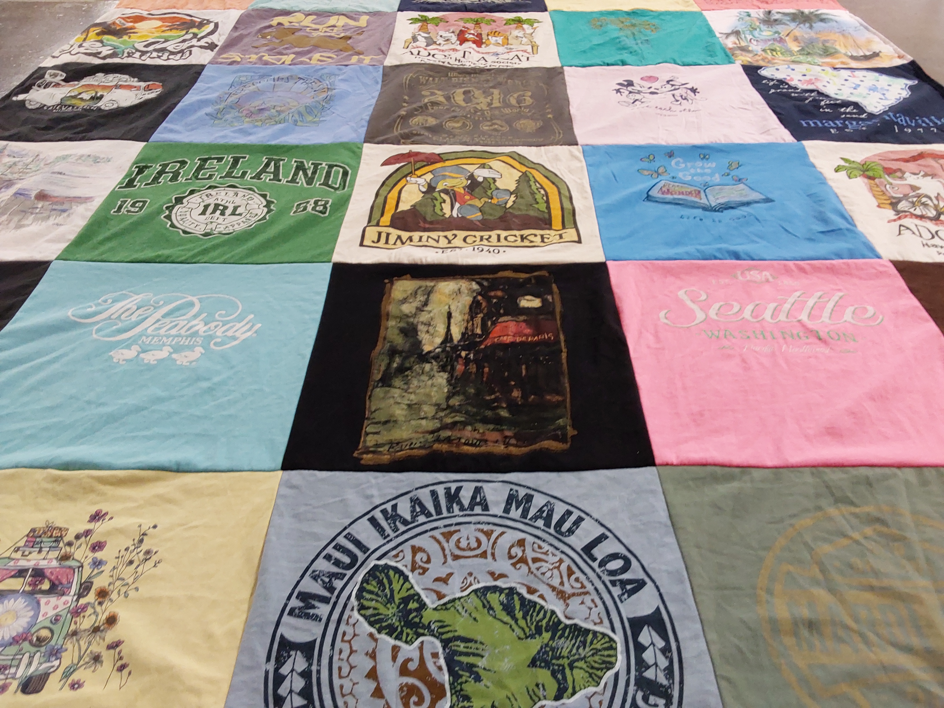 T-shirt quilt with travel, culture themes by Tracy from IL