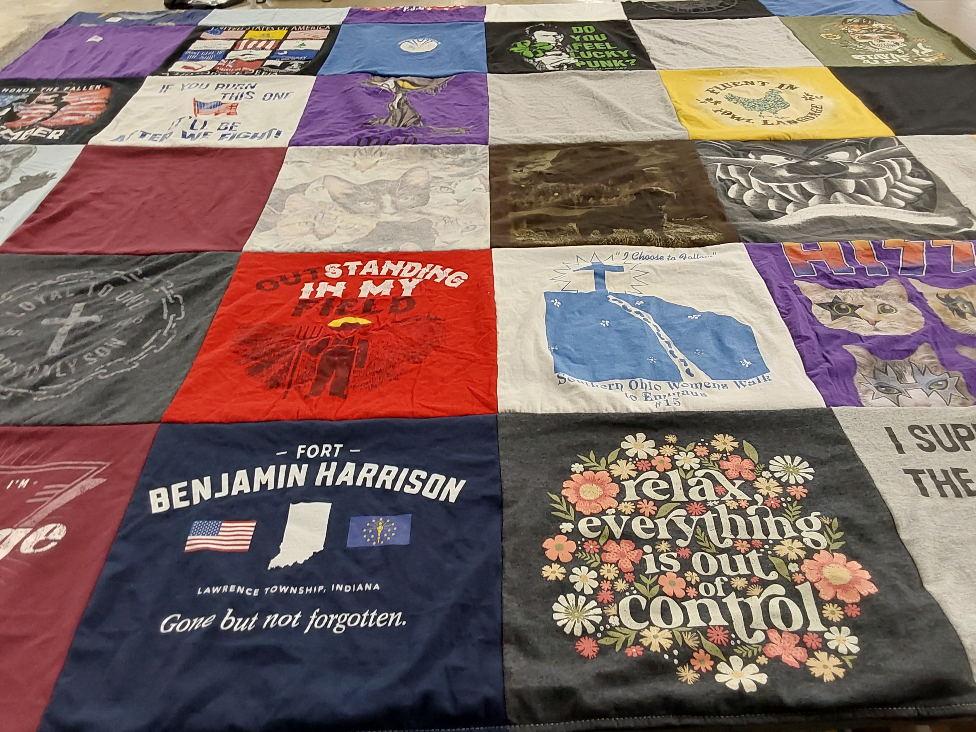 T-shirt quilt with military, community service themes by Kelly from OH