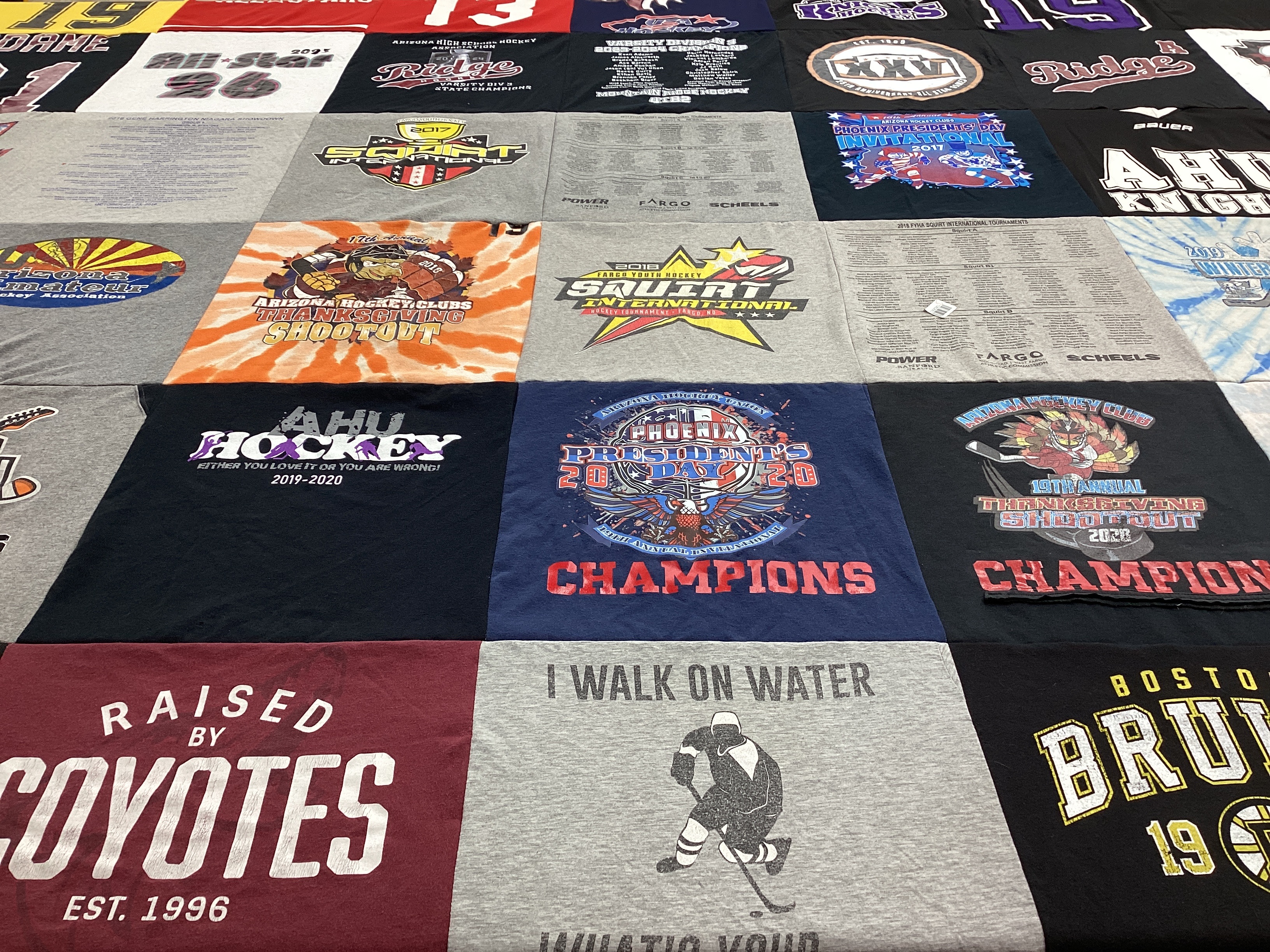 T-shirt quilt with hockey, sports themes by Kristen from AZ