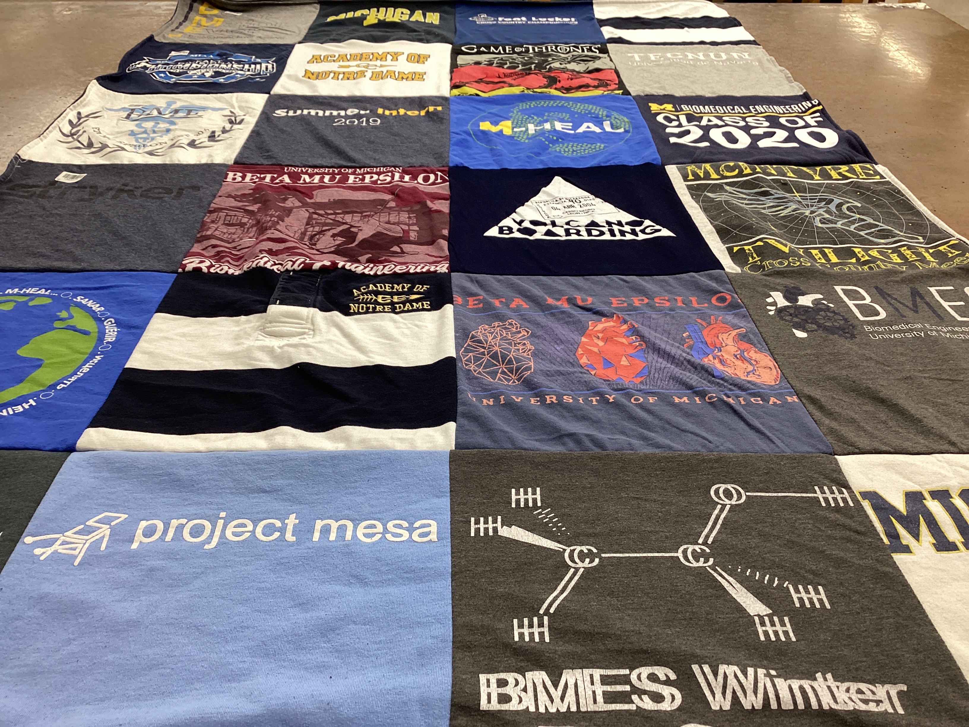 T-shirt quilt featuring cross country team by Emily from CO