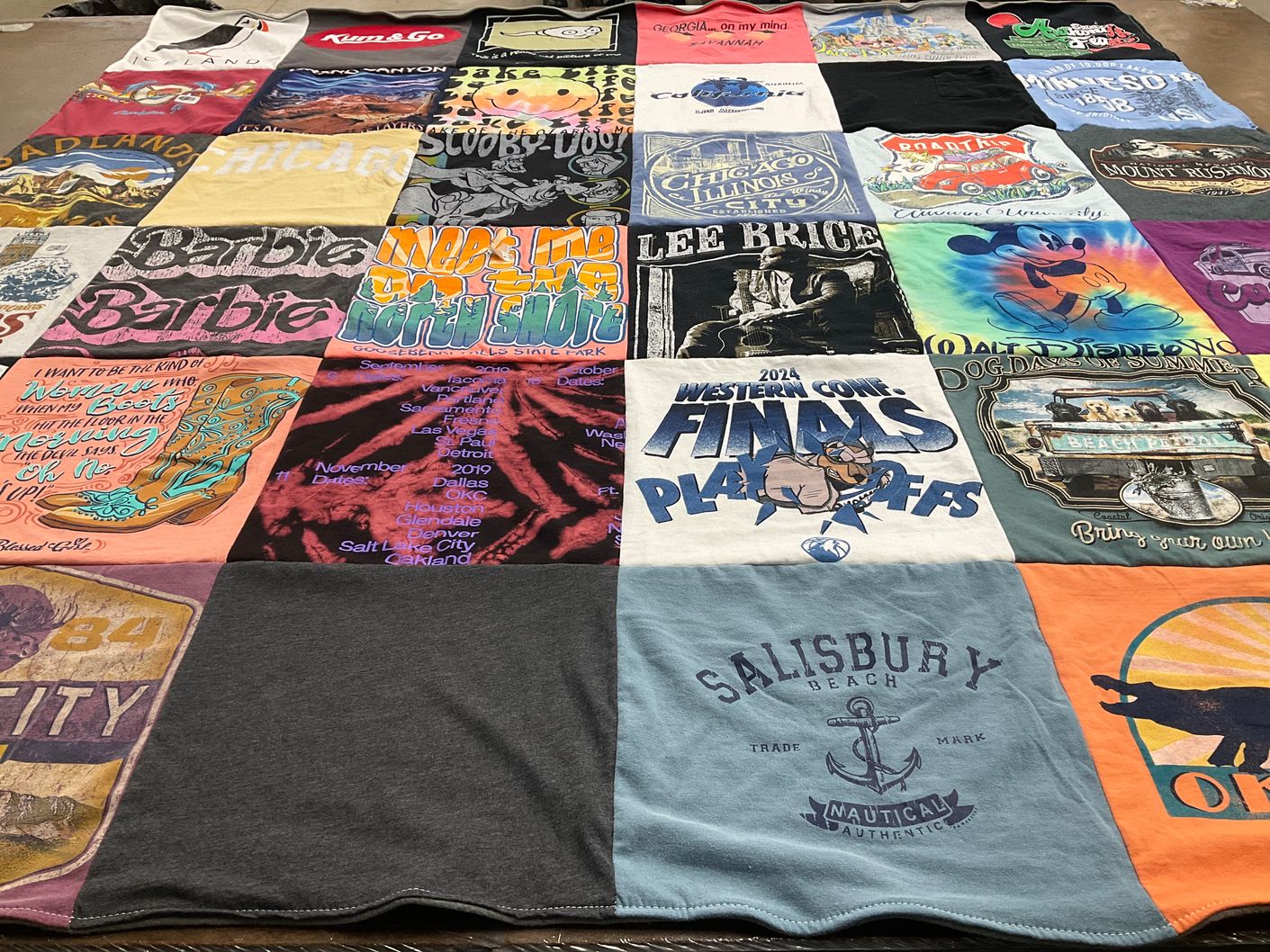 T-shirt quilt with disney, music themes by Jeana from MA