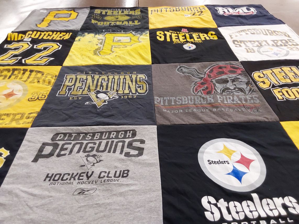 T-shirt quilt featuring pittsburgh steelers football team, pittsburgh penguins hockey club by Donald from PA
