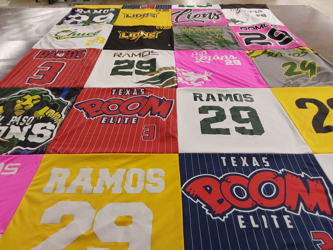 T-shirt quilt with sports, community themes by Lorraine from TX