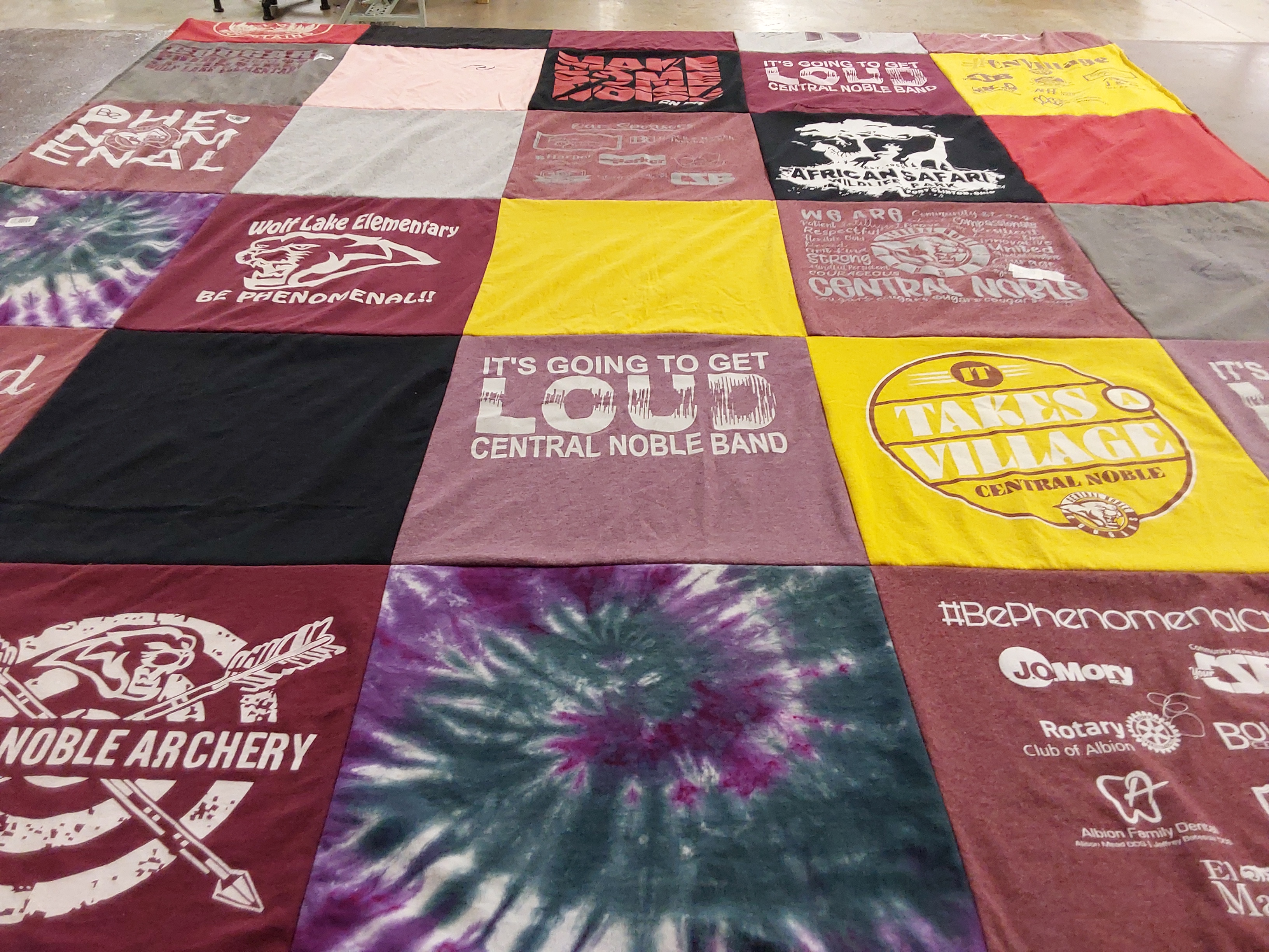 T-shirt quilt featuring central noble band by Jory from IN