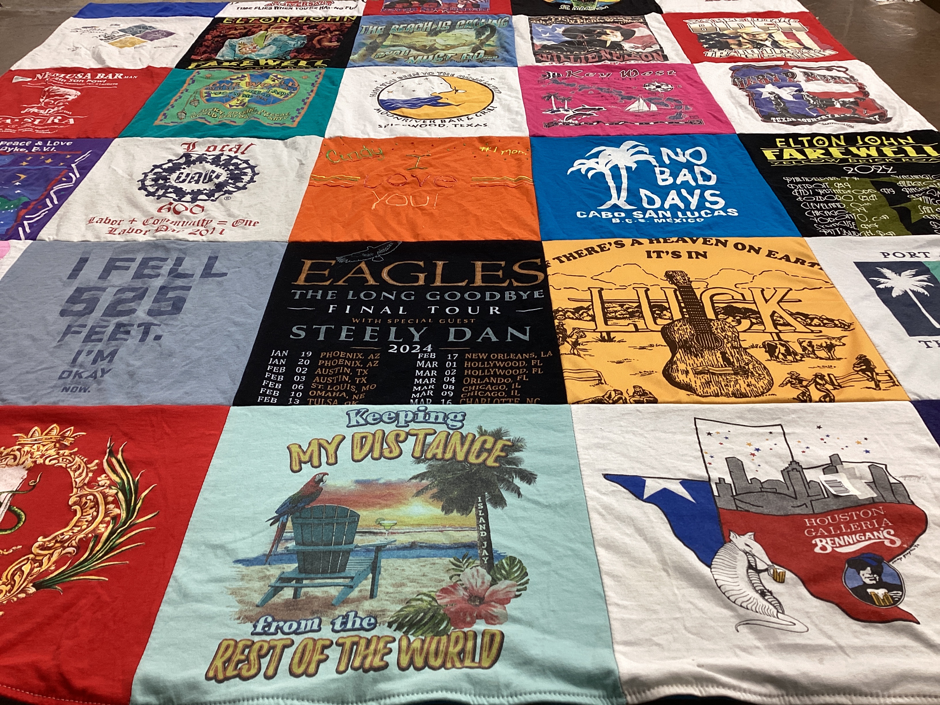 T-shirt quilt with music, travel themes by Cynthia from TX