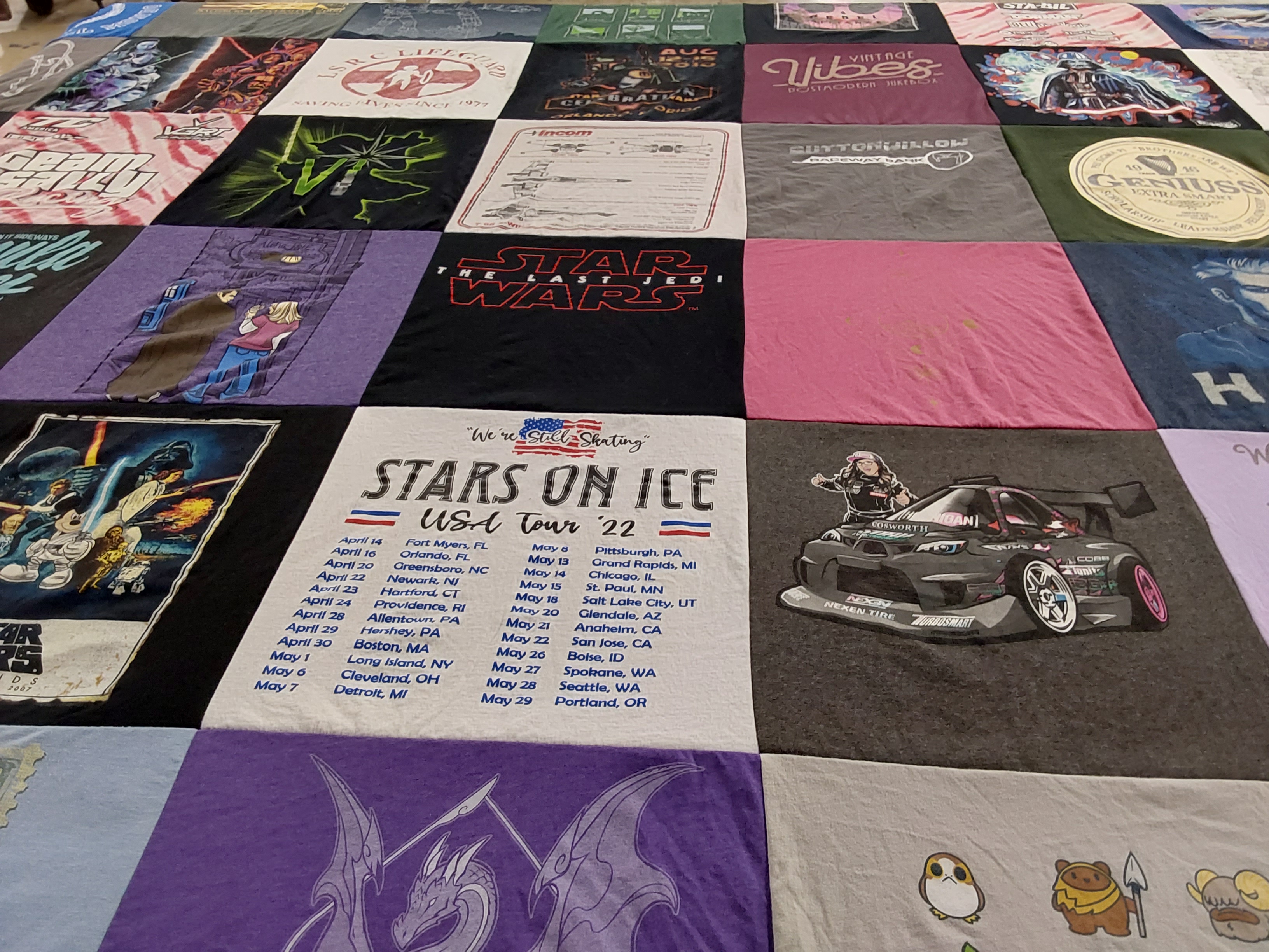 T-shirt quilt with ice skating, racing themes by Rebecca from SC