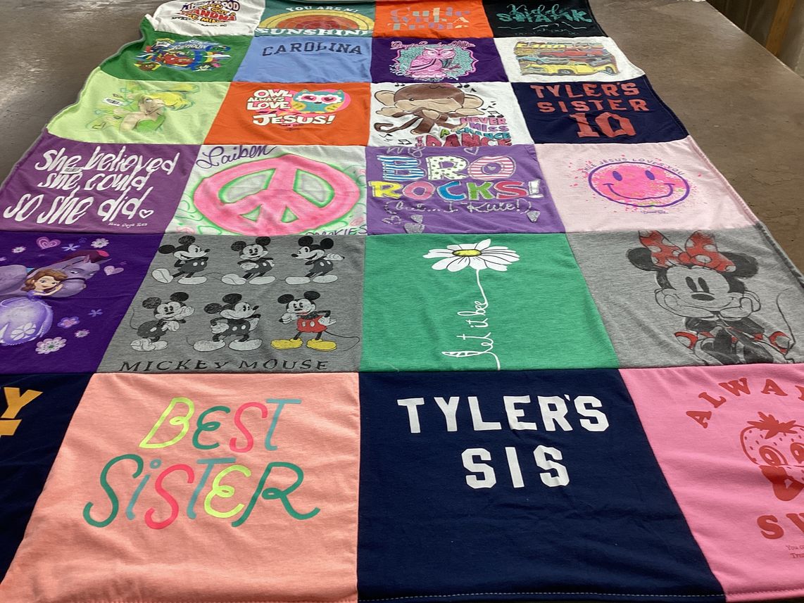 T-shirt quilt with family, disney themes by Robin from VA