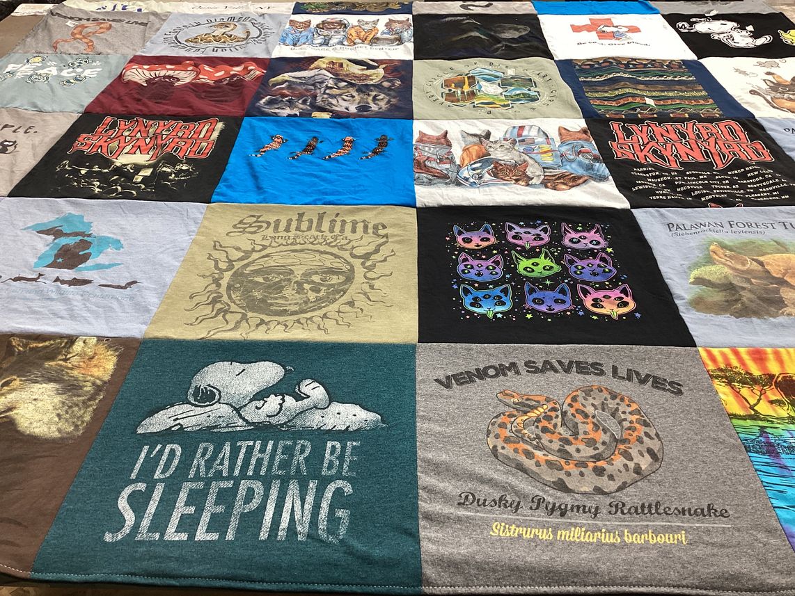 T-shirt quilt with music, wildlife themes by Katie from AZ