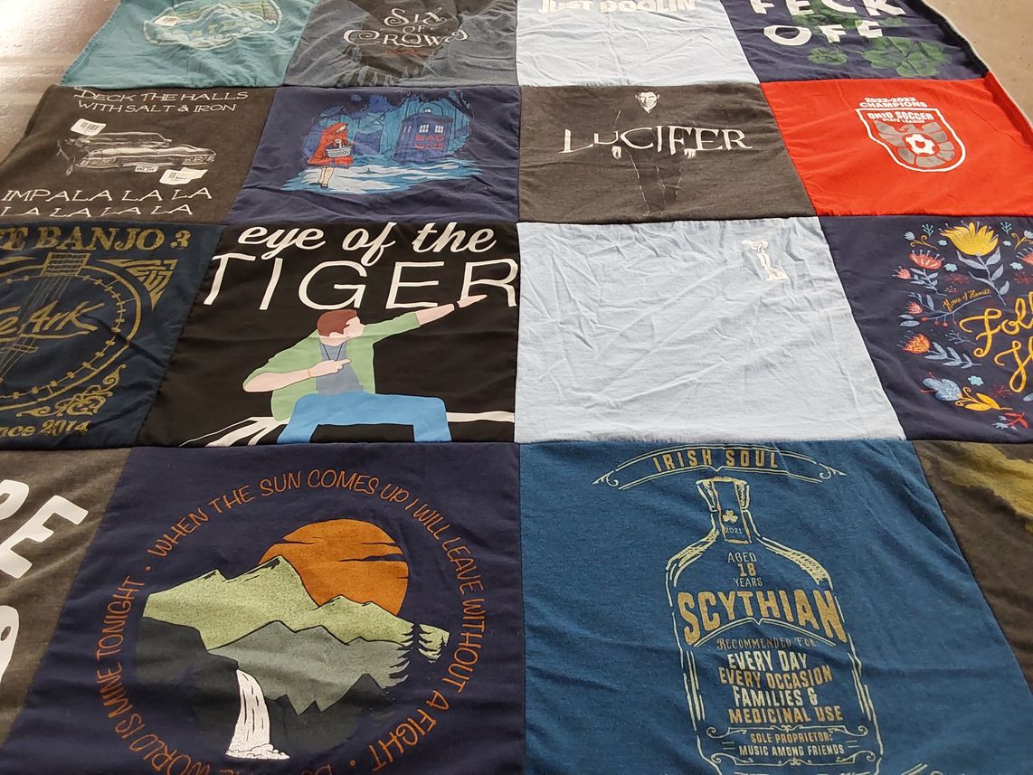 T-shirt quilt with music, television themes by Michelle from OH