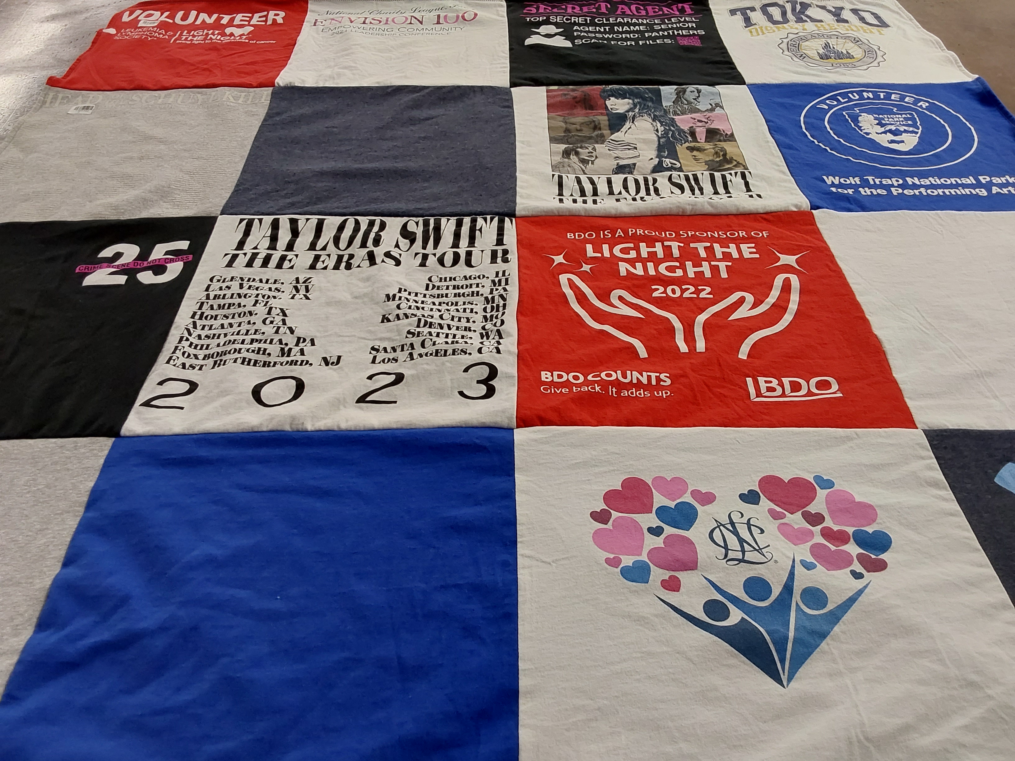T-shirt quilt with music, volunteering themes by Susan from VA