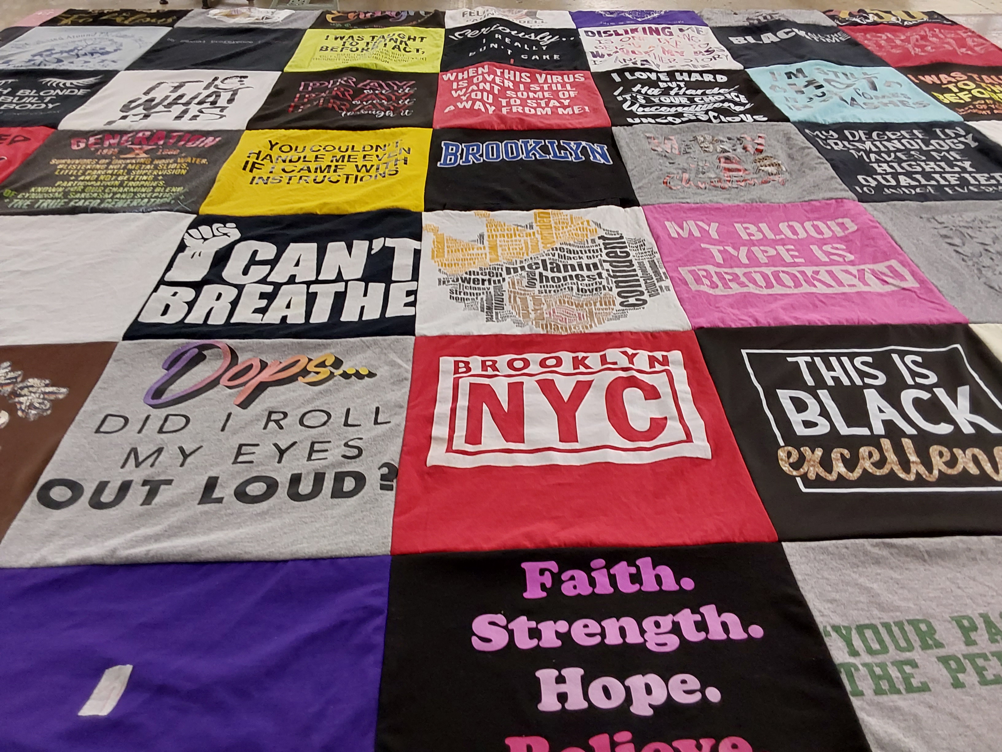T-shirt quilt with social justice, community themes by LaShanda from NC