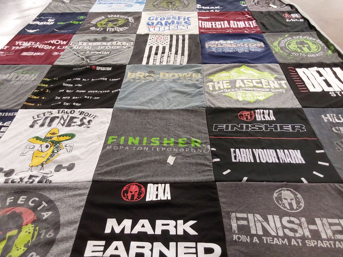 T-shirt quilt with fitness, obstacle racing themes by Lester from PA