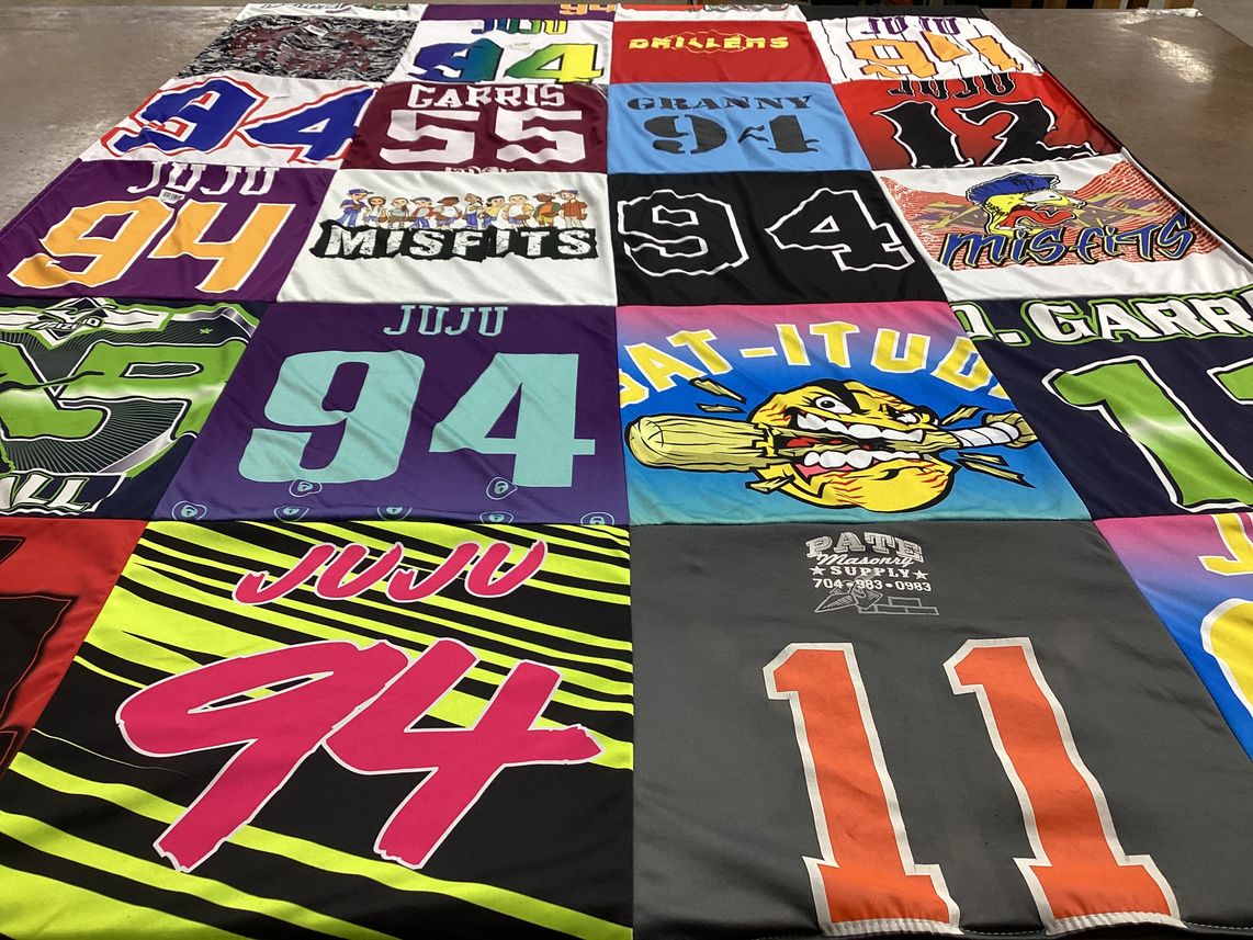 T-shirt quilt with sports, music themes by SHEAMUS from NC