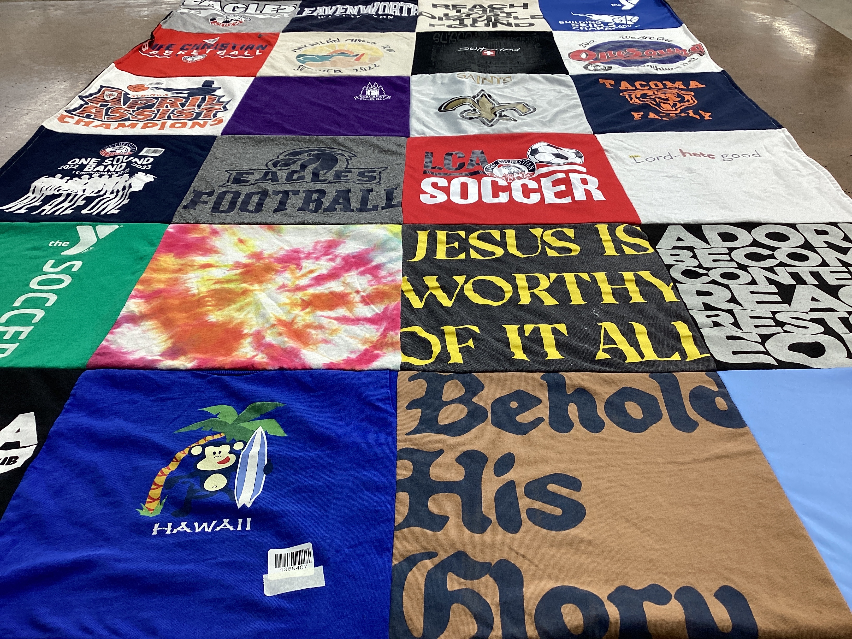 T-shirt quilt with sports, religion themes by Jena from WA