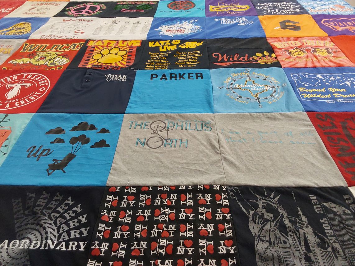 T-shirt quilt with theater, arts themes by M from TX