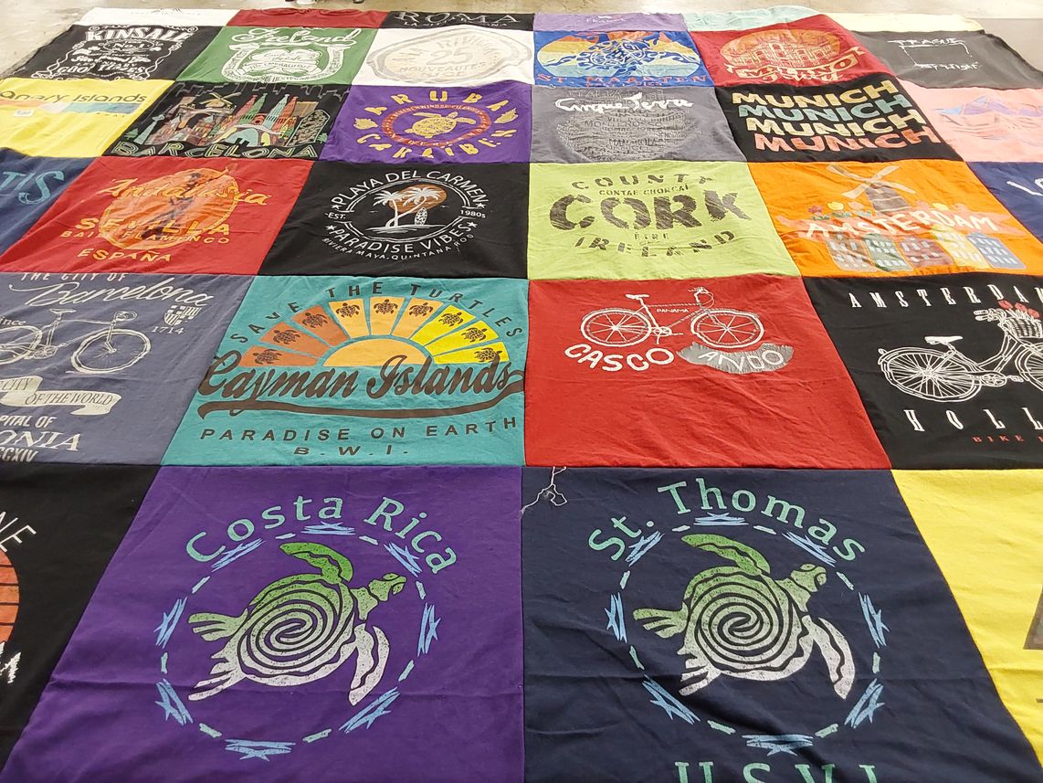T-shirt quilt with travel, beaches themes by CATHERINE from TX