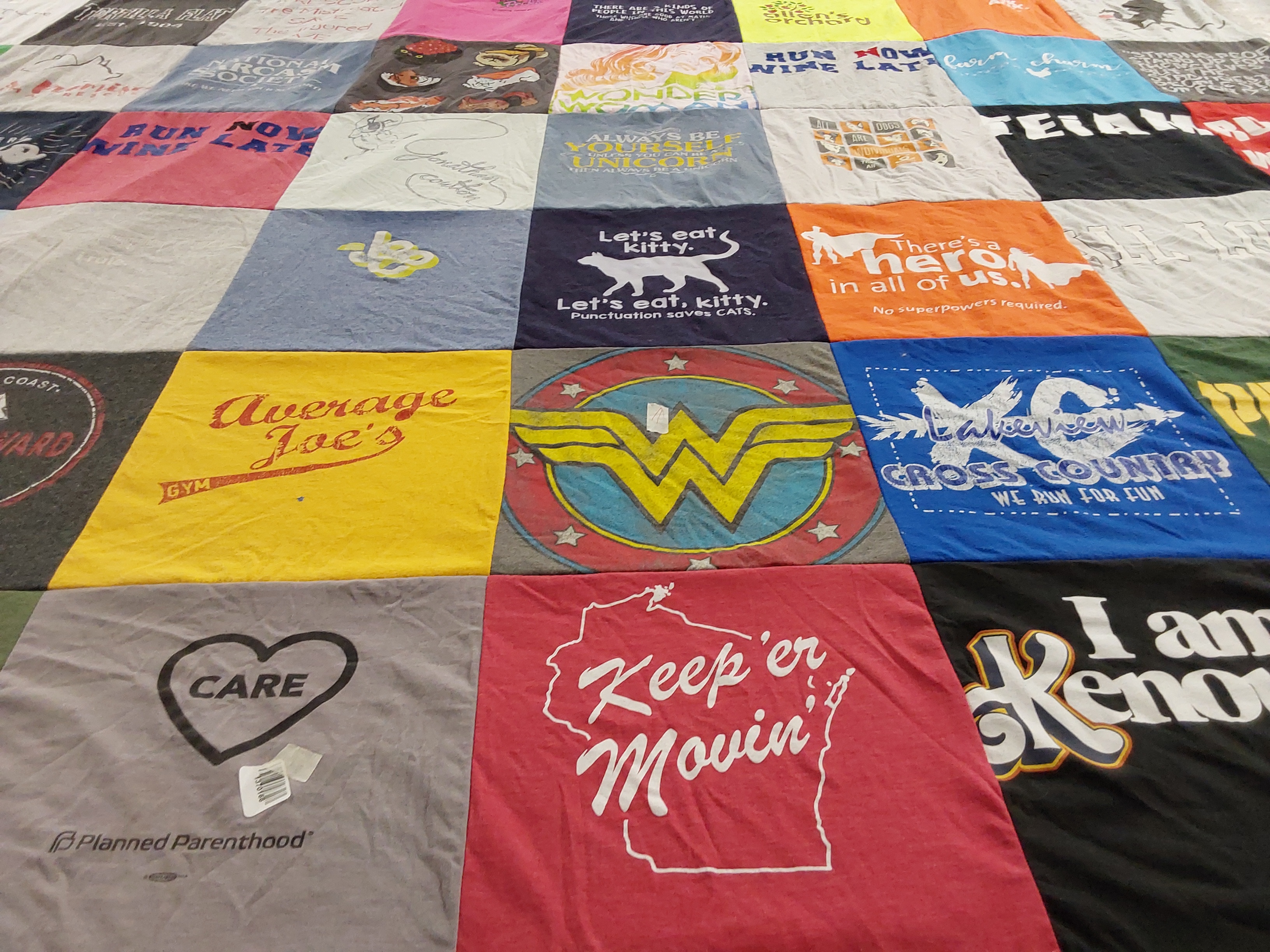 T-shirt quilt featuring la crosse cross country by Jennifer from IA