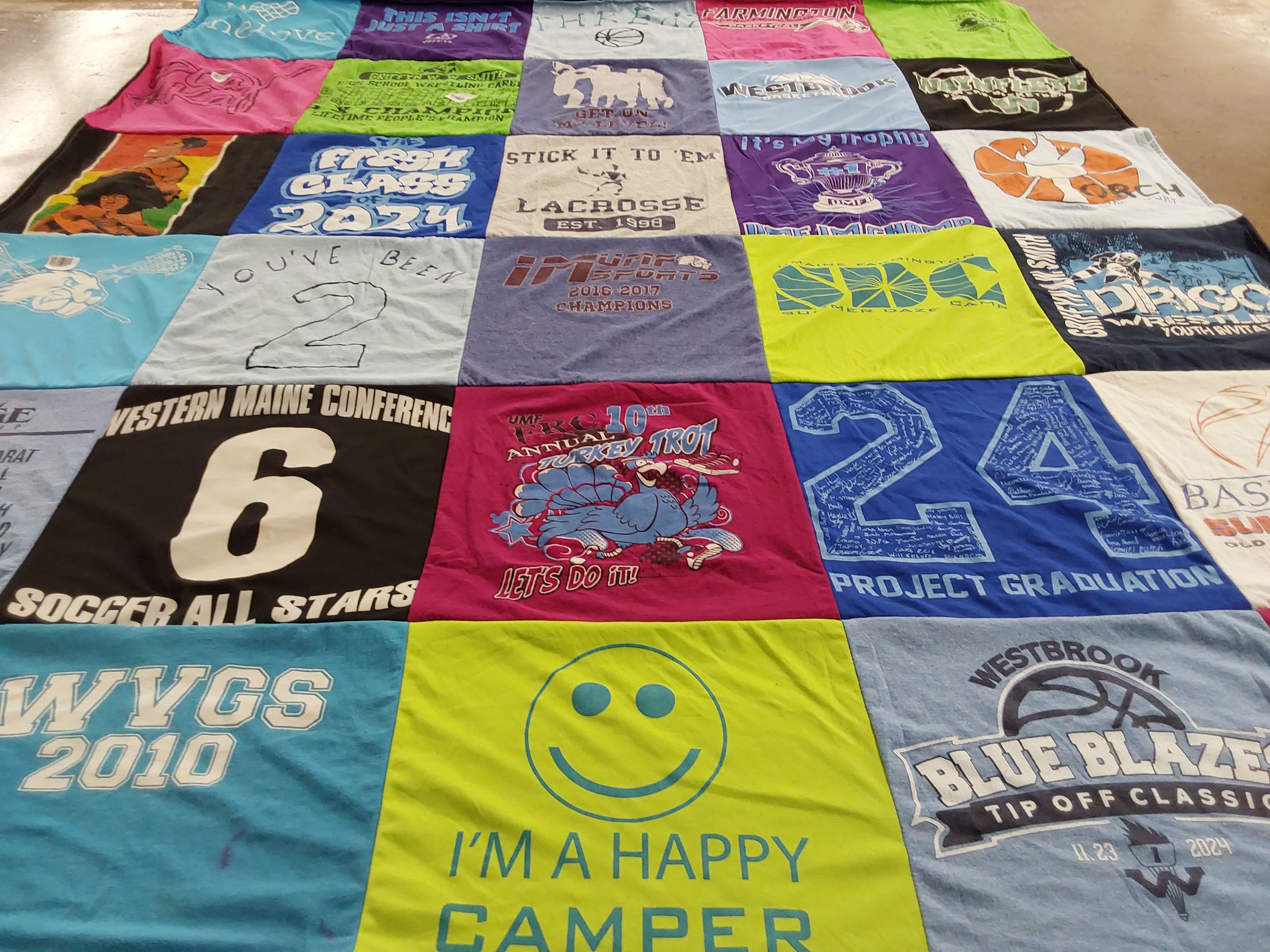 T-shirt quilt featuring blue blazers by Rhiannan from ME