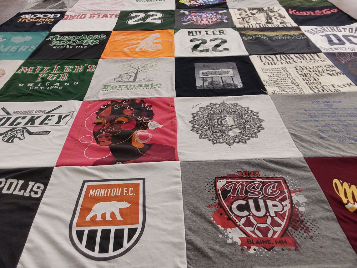 T-shirt quilt featuring manitou fc, mounds view hockey by Lesa from MN