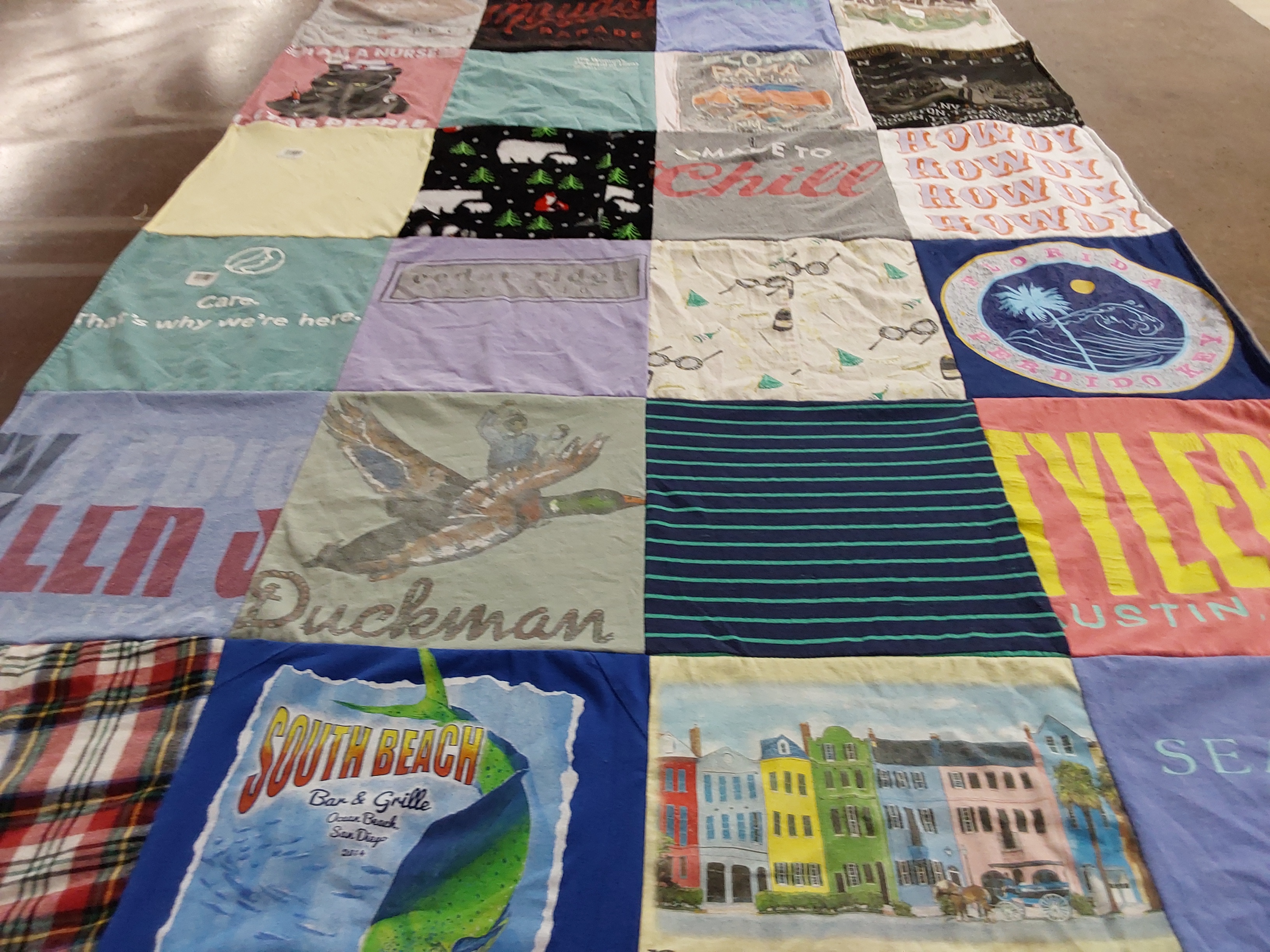 T-shirt quilt with beach, relaxation themes by Marcy from TX