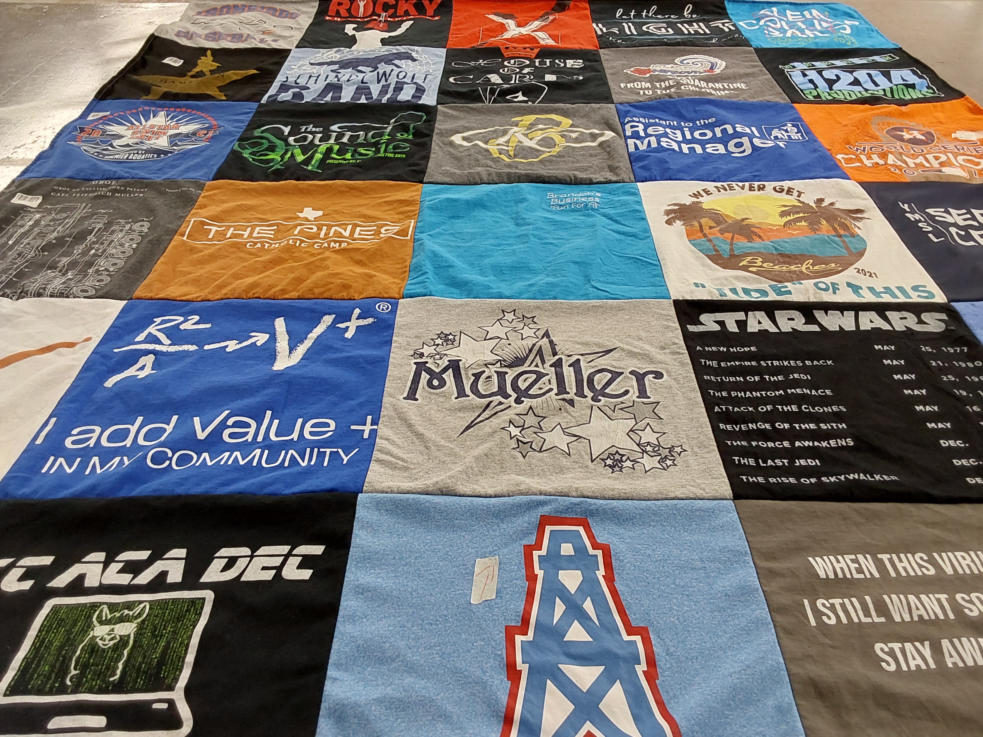 T-shirt quilt with science, music themes by Julie from TX