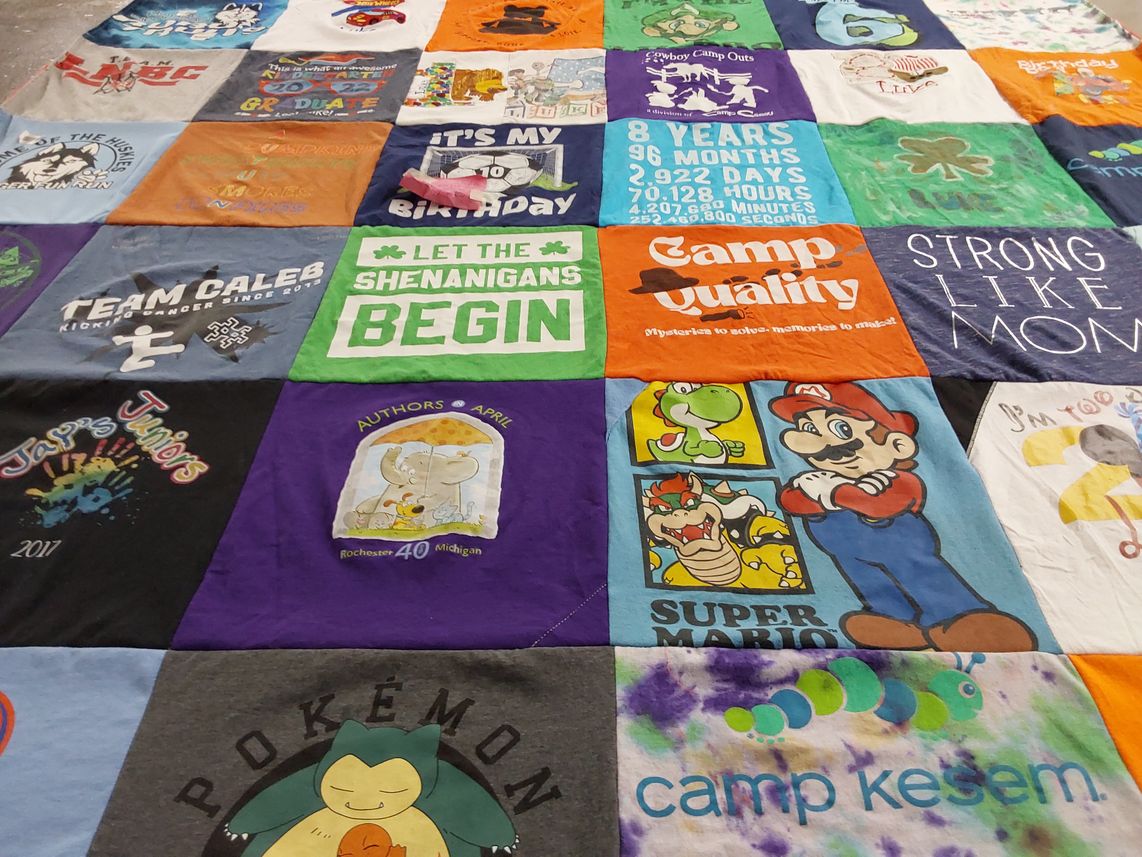 T-shirt quilt with camping, gaming themes by Kelly from MI