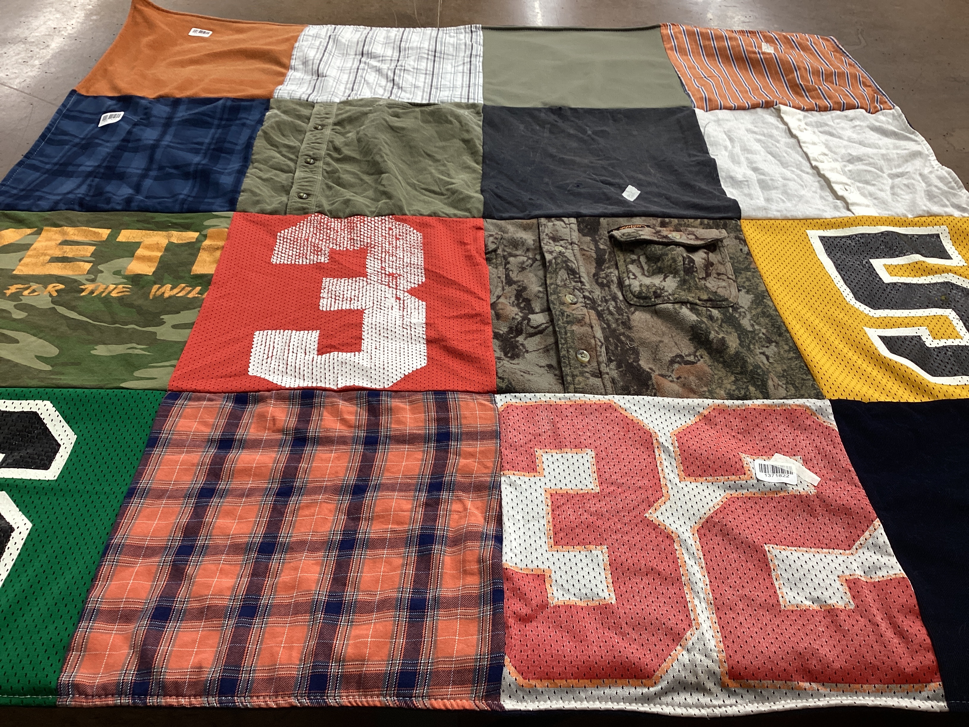 T-shirt quilt with sports, outdoors themes by Jenny from TX