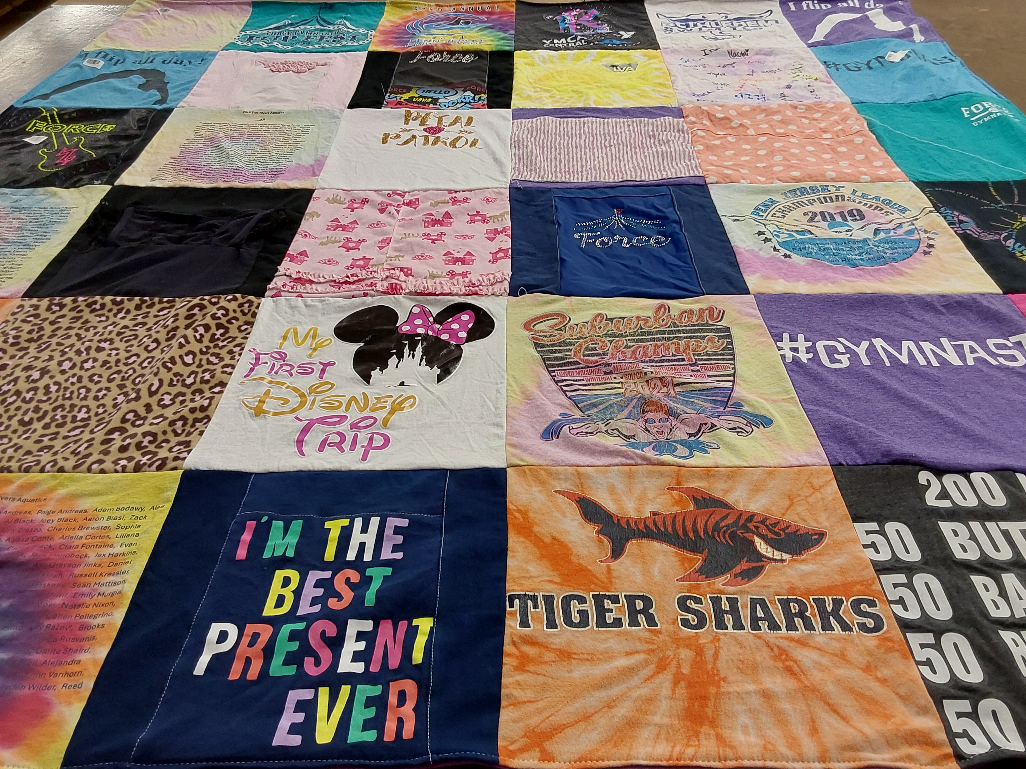 T-shirt quilt with disney, gymnastics themes by Mackenzie from PA