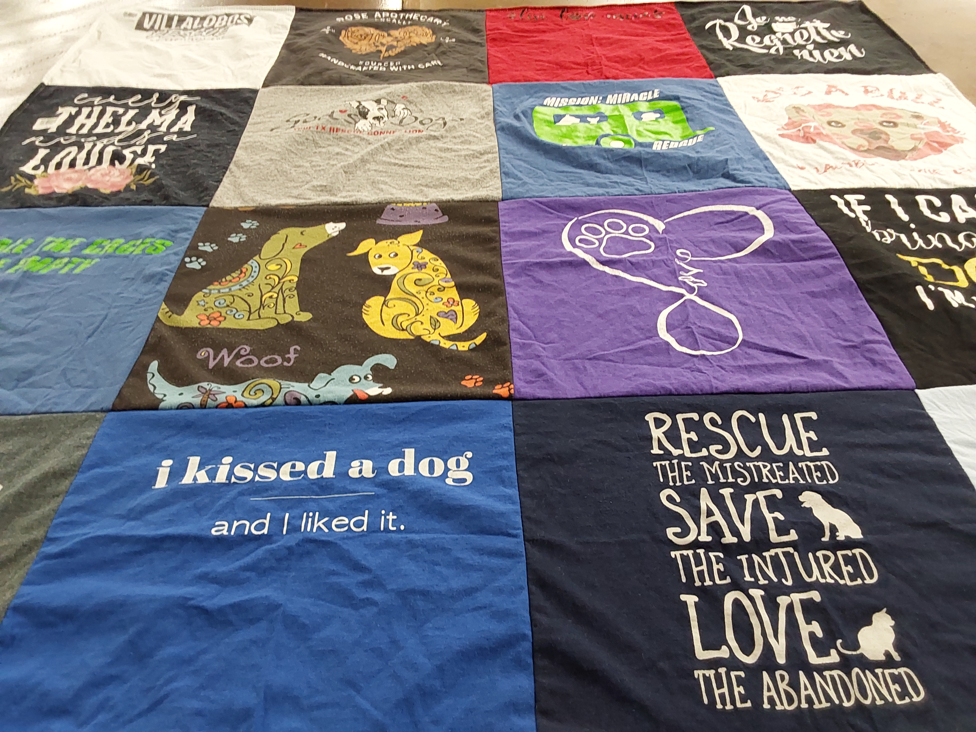 T-shirt quilt with animals, dog rescue themes by Thelma from TX