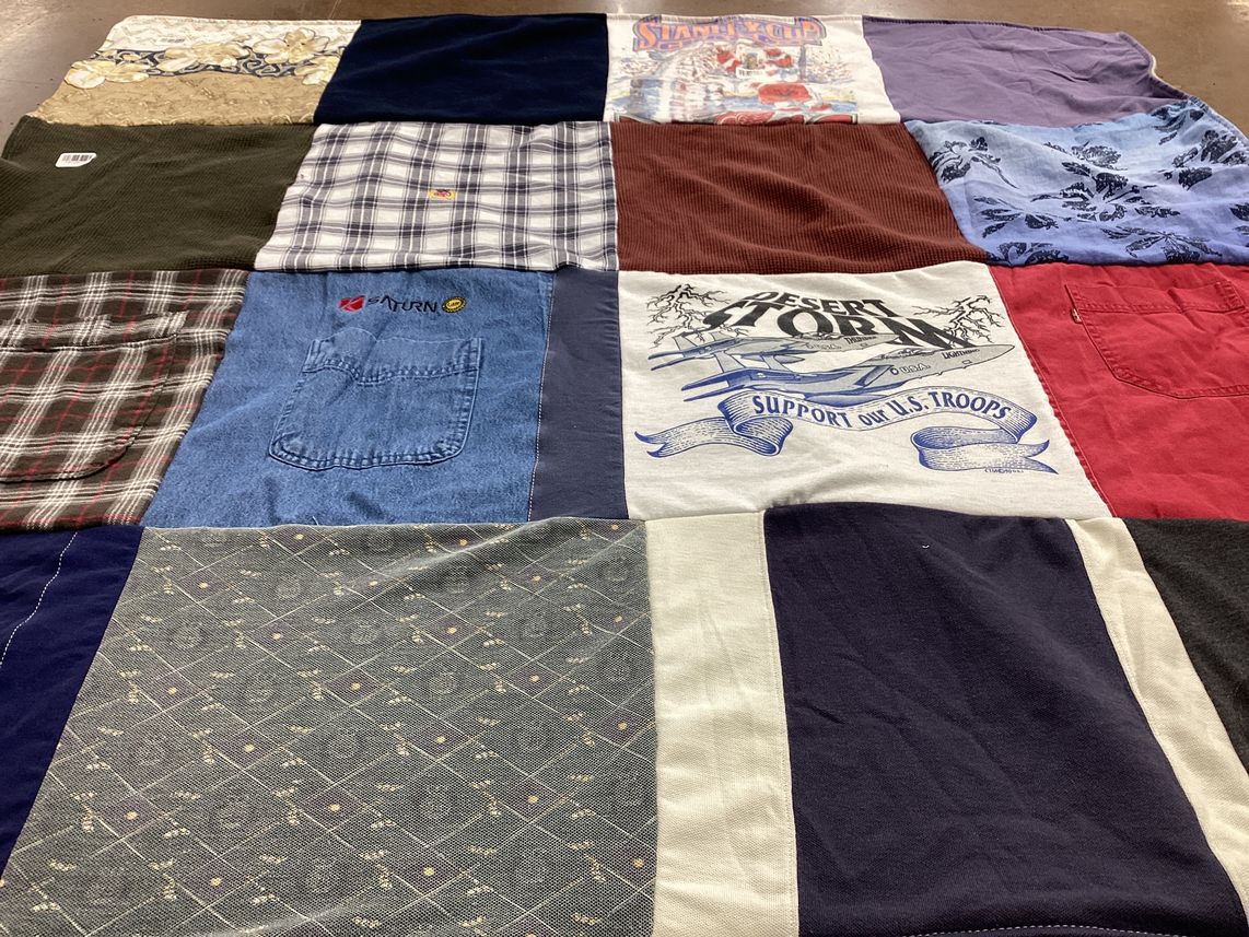 T-shirt quilt with supporting military, outdoor activities themes by Susan from MI